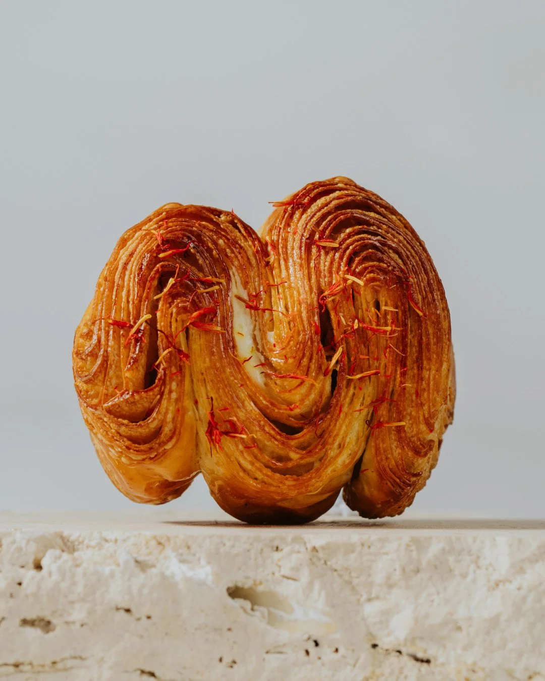 A new wave has landed.⁠
⁠
Our Orange &amp; Cardamom Croissant Wave layers buttery croissant pastry with fragrant orange and cardamom cream, finished with a light glaze of orange blossom syrup. Bright citrus, warm spice, and all those delicate croissa
