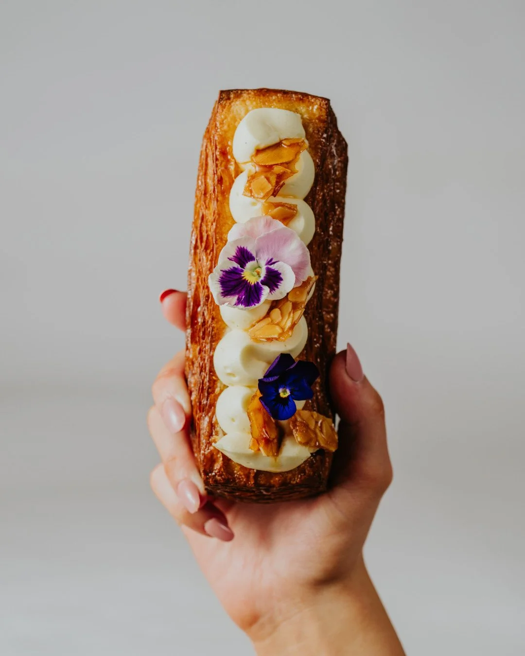 Afternoon sweet, anyone? 🌸⁠
⁠
Meet the Bee Sting Croissant Bar. Honey-butter glazed, baked golden, then loaded with almond praline, honey cake and vanilla mousse. Finished with bee sting almond brittle for that extra crunch.⁠
⁠
Duck in for a lunch t