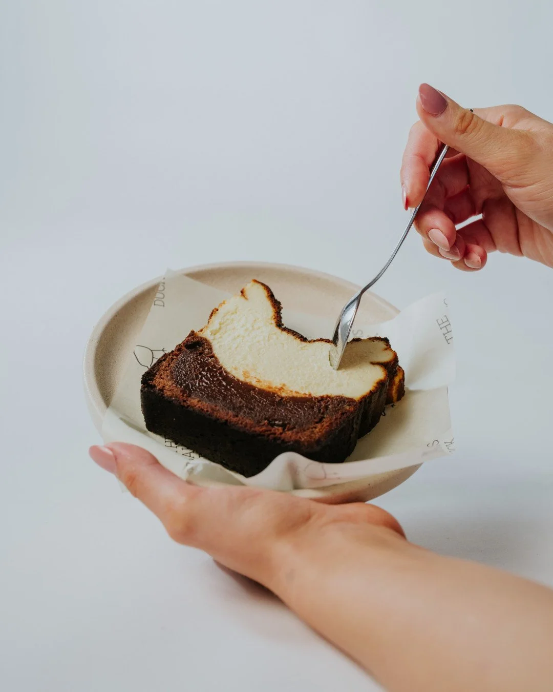 Gluten free never looked so good. 🤍⁠
⁠
The Brownie Vanilla Basque Cheesecake. Creamy vanilla basque cheesecake sitting on a fudge brownie base. ⁠
⁠
Duck in and grab a slice. 🥐⁠
⁠
#thebakersduck
