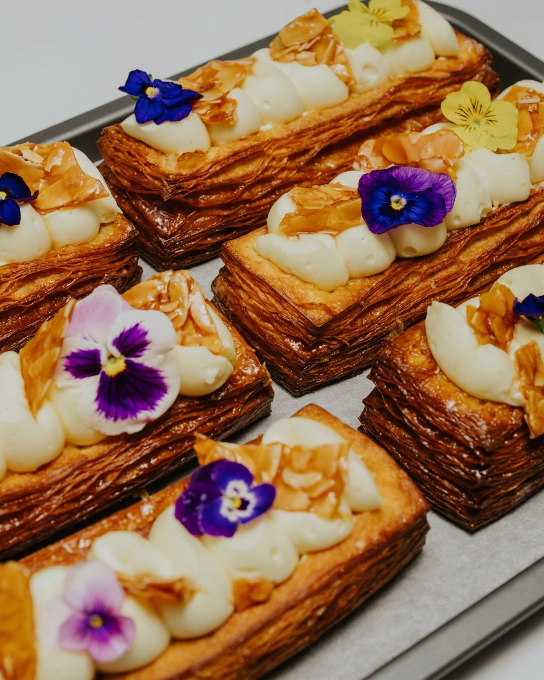 A Sunday at The Baker&rsquo;s Duck is calling. 🍯🌸

The Bee Sting Croissant Bar. Honey-butter glazed, baked golden, then filled with crunchy almond praline, honey cake and vanilla mousse. Finished with bee sting almond brittle for that extra crunch.