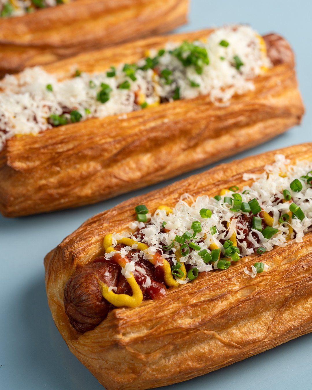 How do you make a hot dog even better? ⁠
⁠
Remove the bun. Add a croissant. 🌭⁠
⁠
A Hot dog, savoury syrup, tomato sauce, American mustard and parmesan dust all wrapped up in flaky, buttery pastry instead of your standard bun.⁠
⁠
Duck in 7AM - 4PM ev
