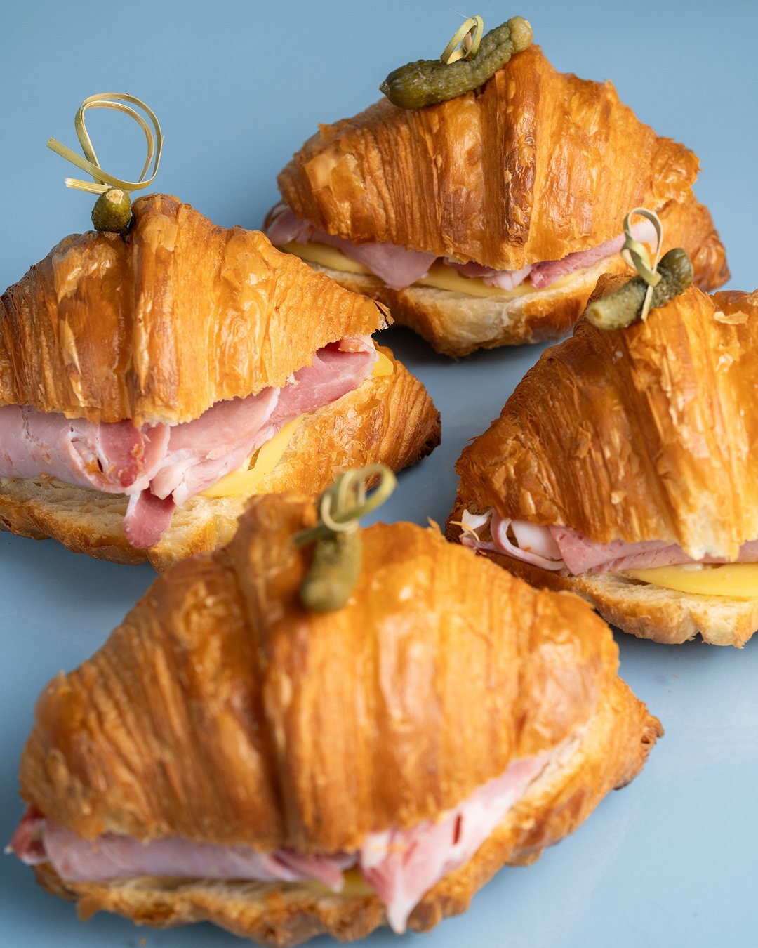 Four days in the making, stone-ground flour, imported French butter and  that's just the croissant! Then we added ham, cheese, cheesy bechamel and a slightly seeded dijon.⁠
⁠
Duck in and try our fan favourite Ham + Cheese Croissant! Open 7AM - 4PM da