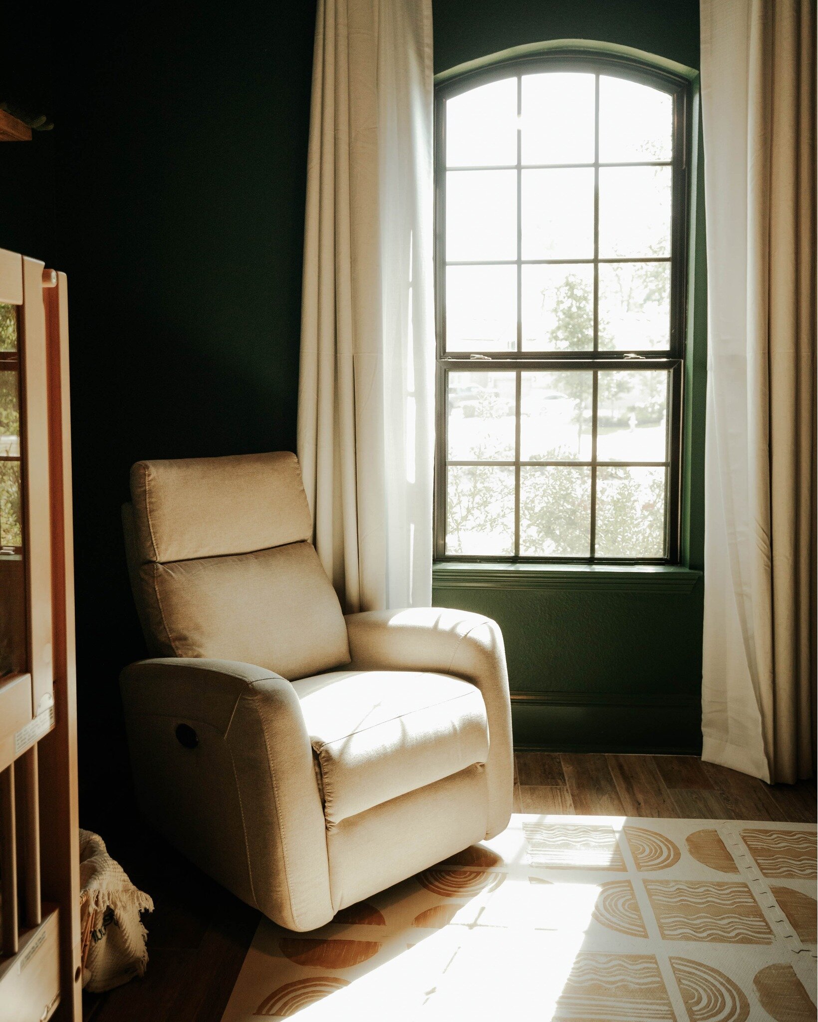 There is beauty in the shadows&mdash;in colors, light, and details. ☀

This stunning arched window floods the nursery with natural light! Sometimes in design, we have to look for ways to bring light into a room without the use of fixtures or lamps. A