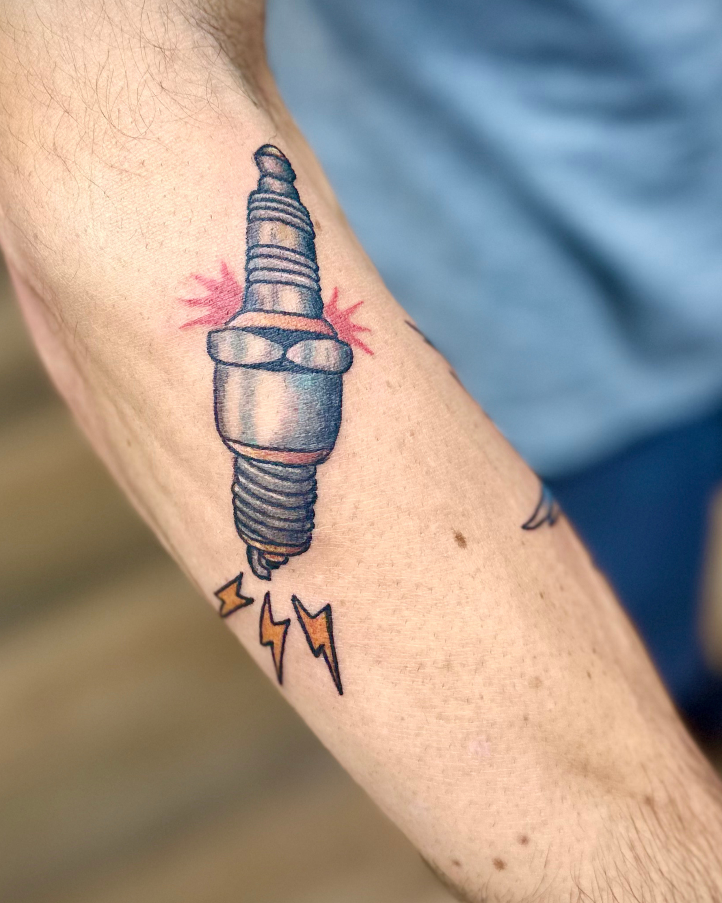 traditional man arm tattoo