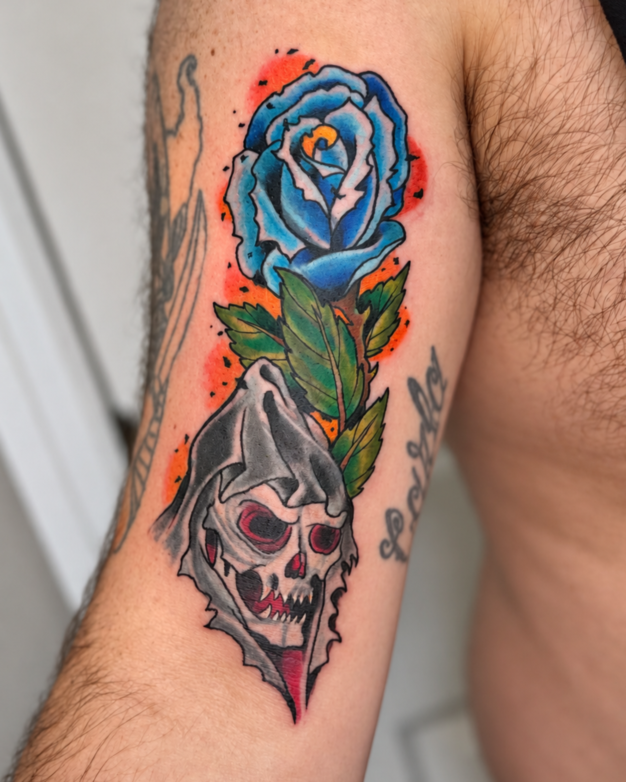 traditional skull and rose tattoo man