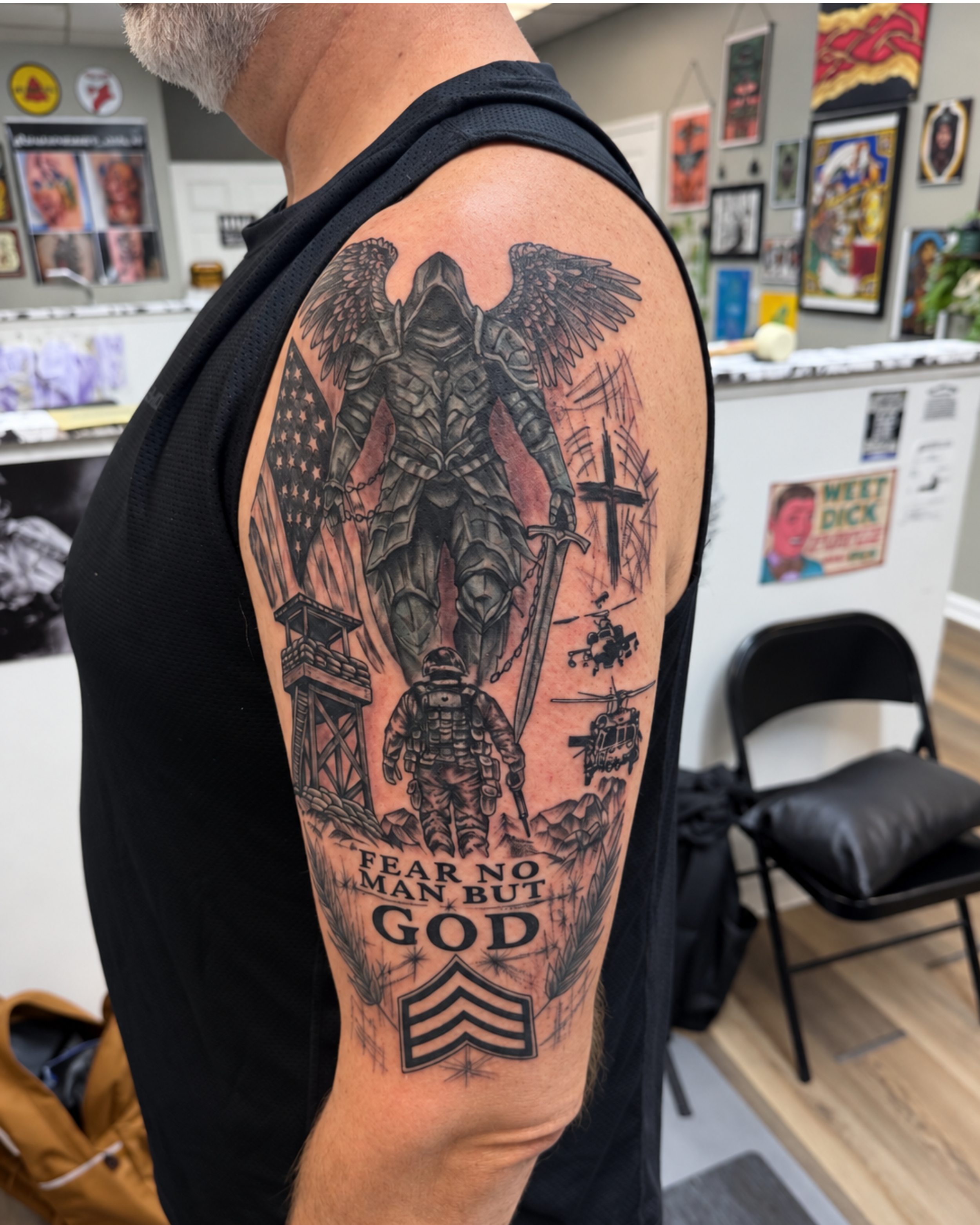 black and grey realistic military tattoo