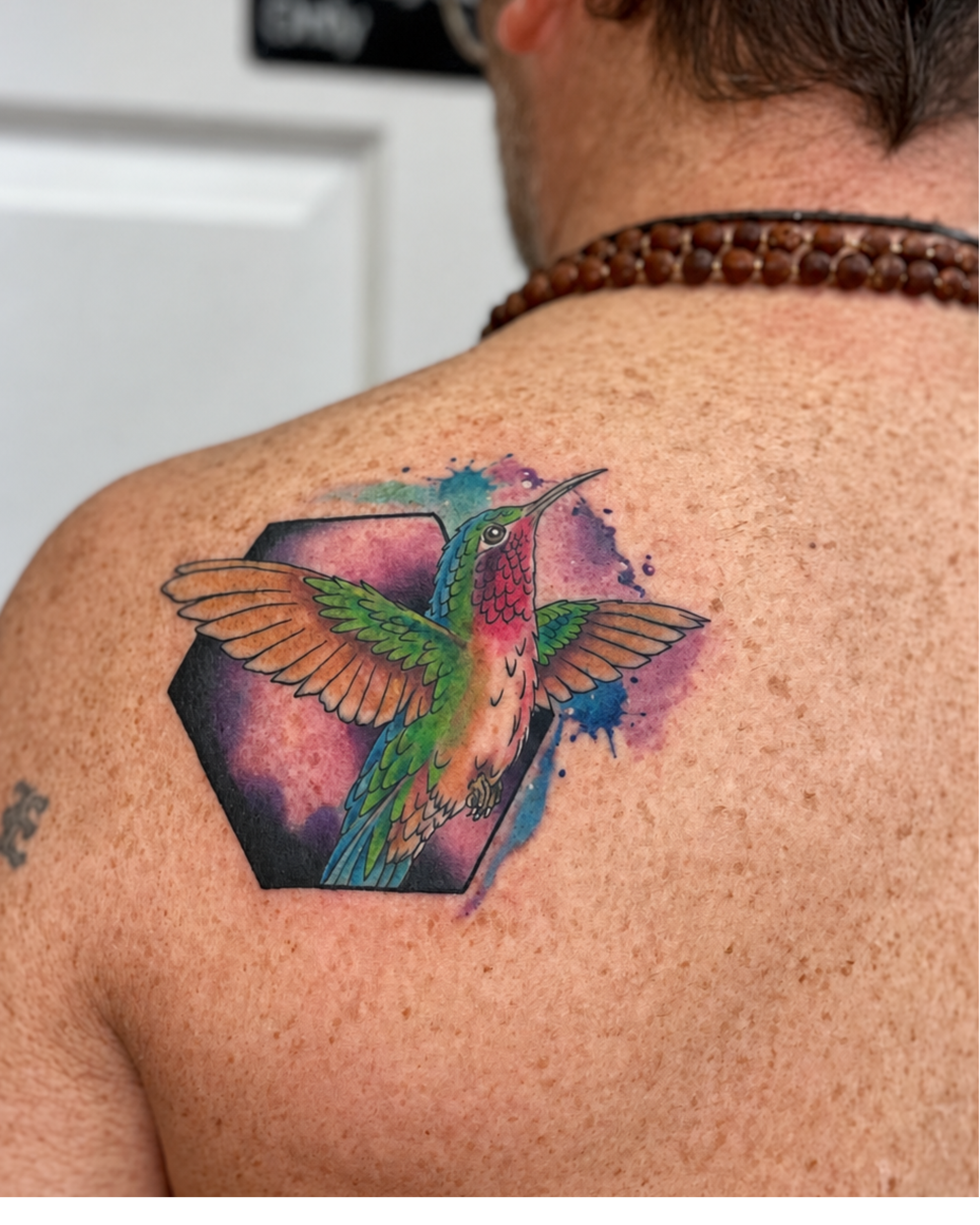 watecolor hummingbird tattoo