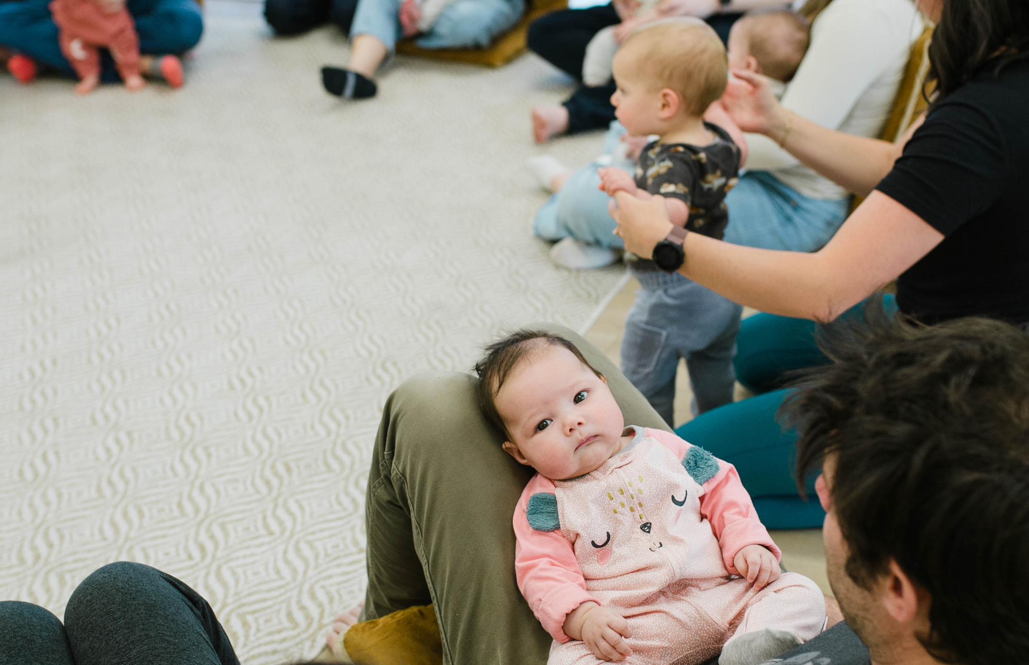 White number 2 on a green background.