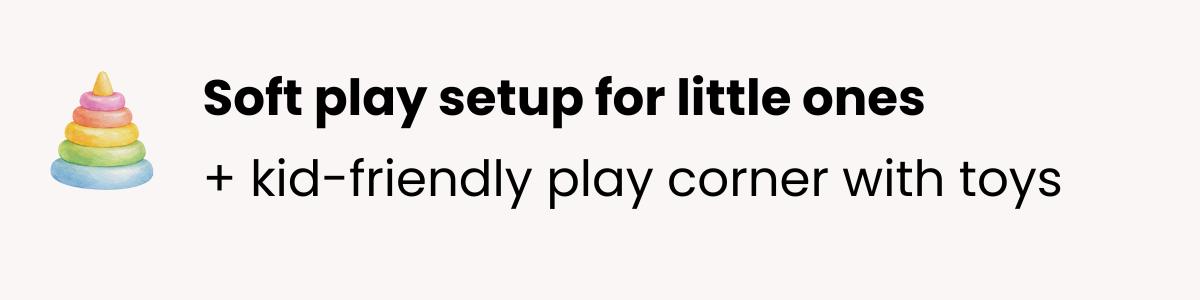 Text reads 'Soft play setup for little ones + kid-friendly play corner with toys' with a colorful stacking ring toy on the left.