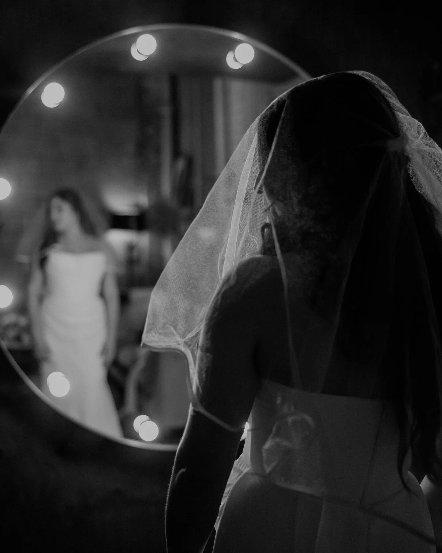Pinching butts during their first look.
Dancing down the aisle like it was their favorite song.
Laughing through every single moment (and yes, she wore her HOKAs all day).

Moody. Cinematic. Untraditional.

Just two people completely being themselves