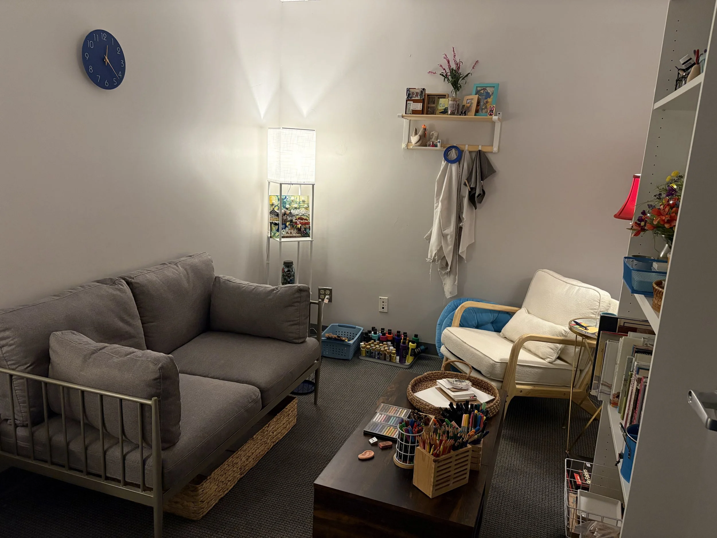 A calm and inviting art therapy space designed for creative expression, reflection, and therapeutic conversation. 