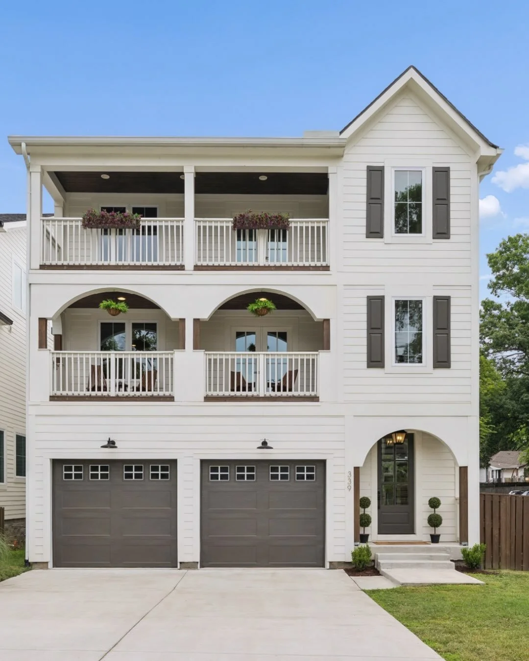 Southern charm meets modern East Nashville living✨

This Charleston-inspired home welcomes you with stacked front porches, timeless architectural details, and beautifully designed spaces throughout. Inside, you&rsquo;ll find a chef&rsquo;s kitchen, a