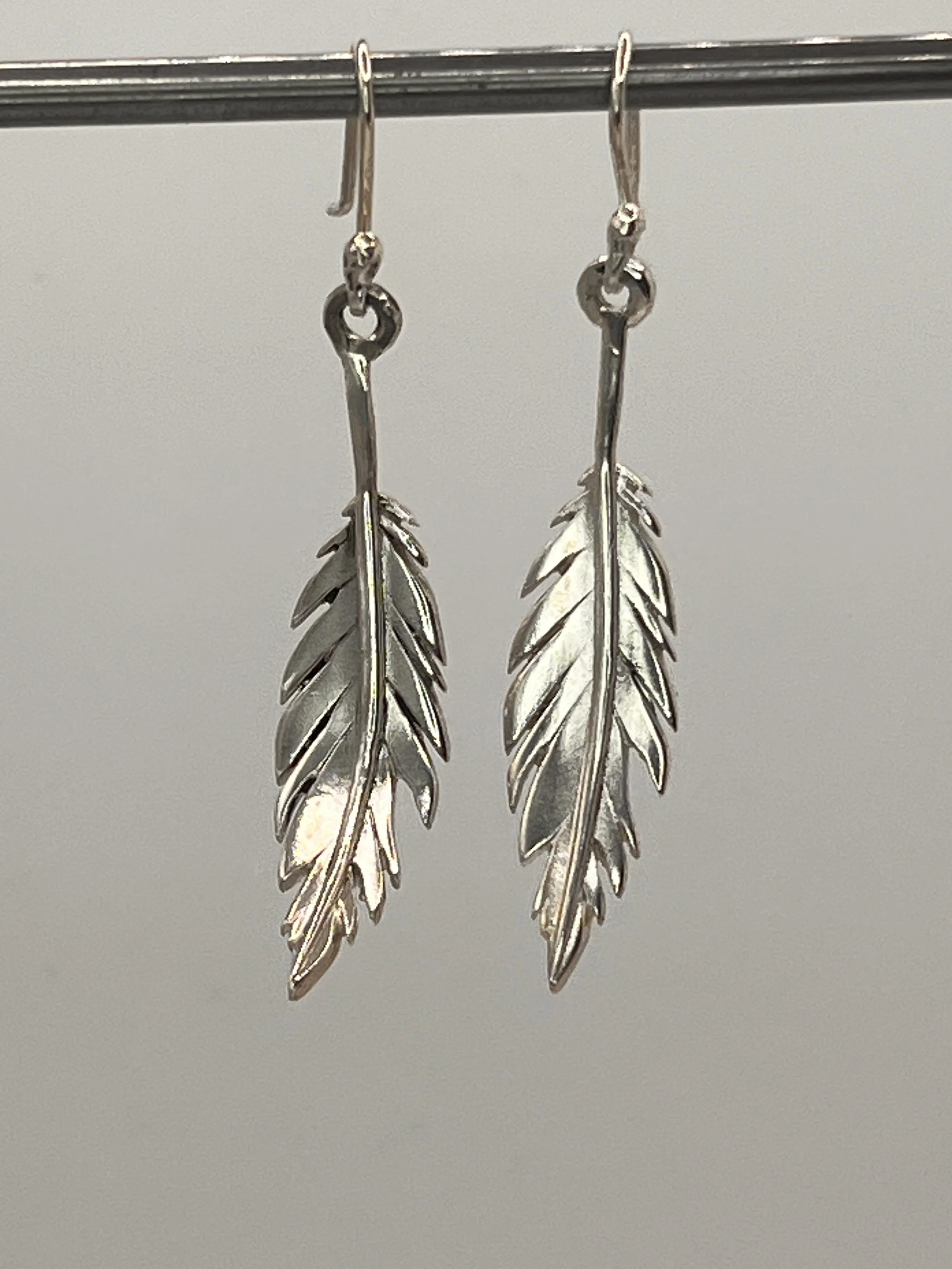 Silver feather earrings