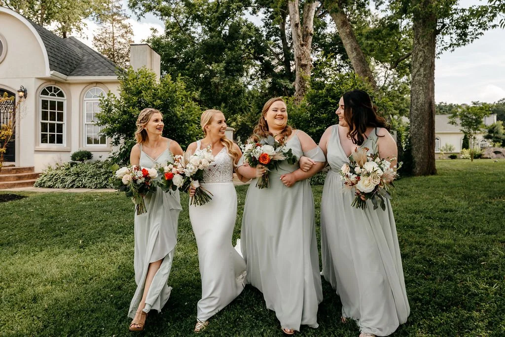 Wedding photography in richmond virginia of bridesmaids walking