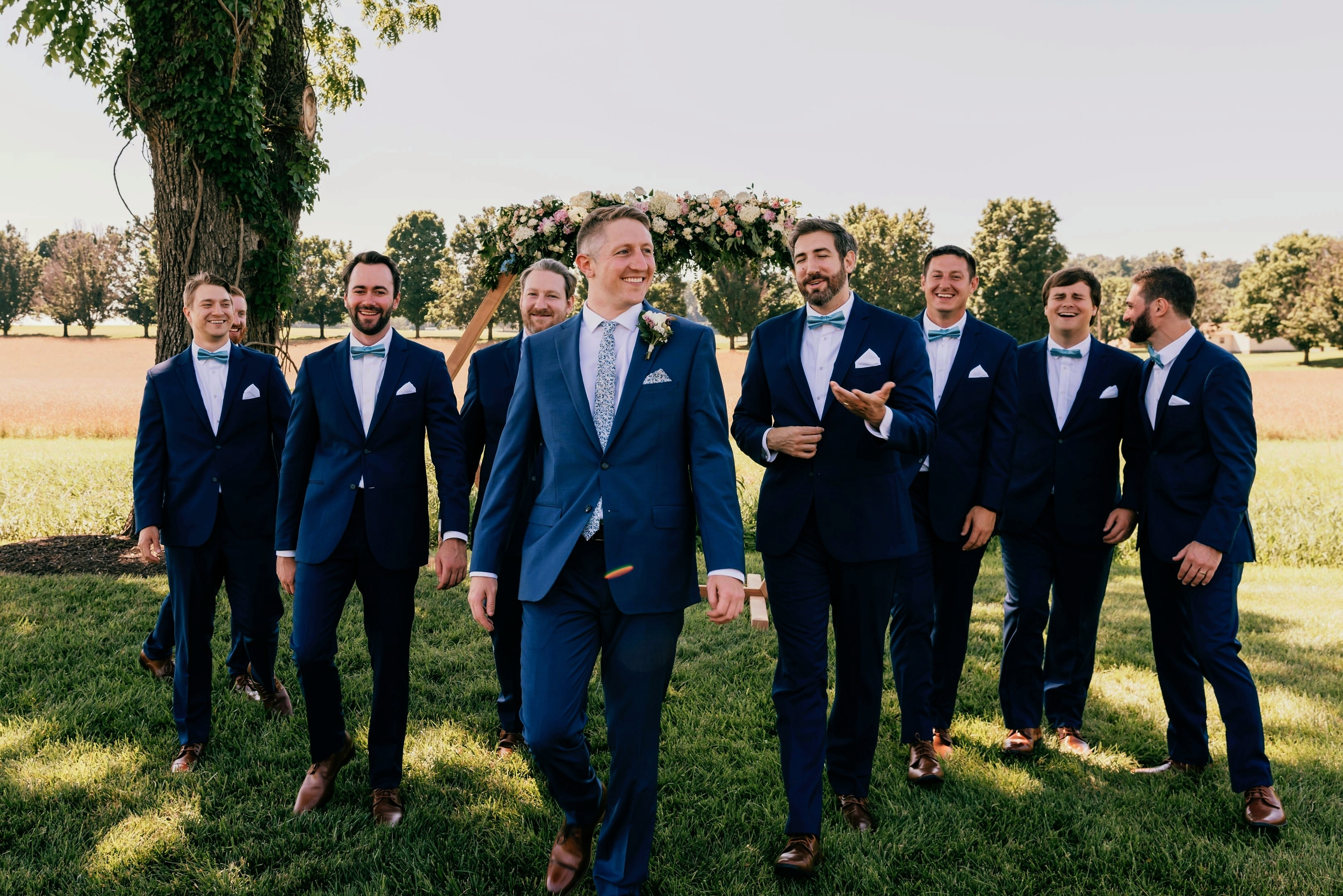 groomsmen+walking+wedding+Photography.png