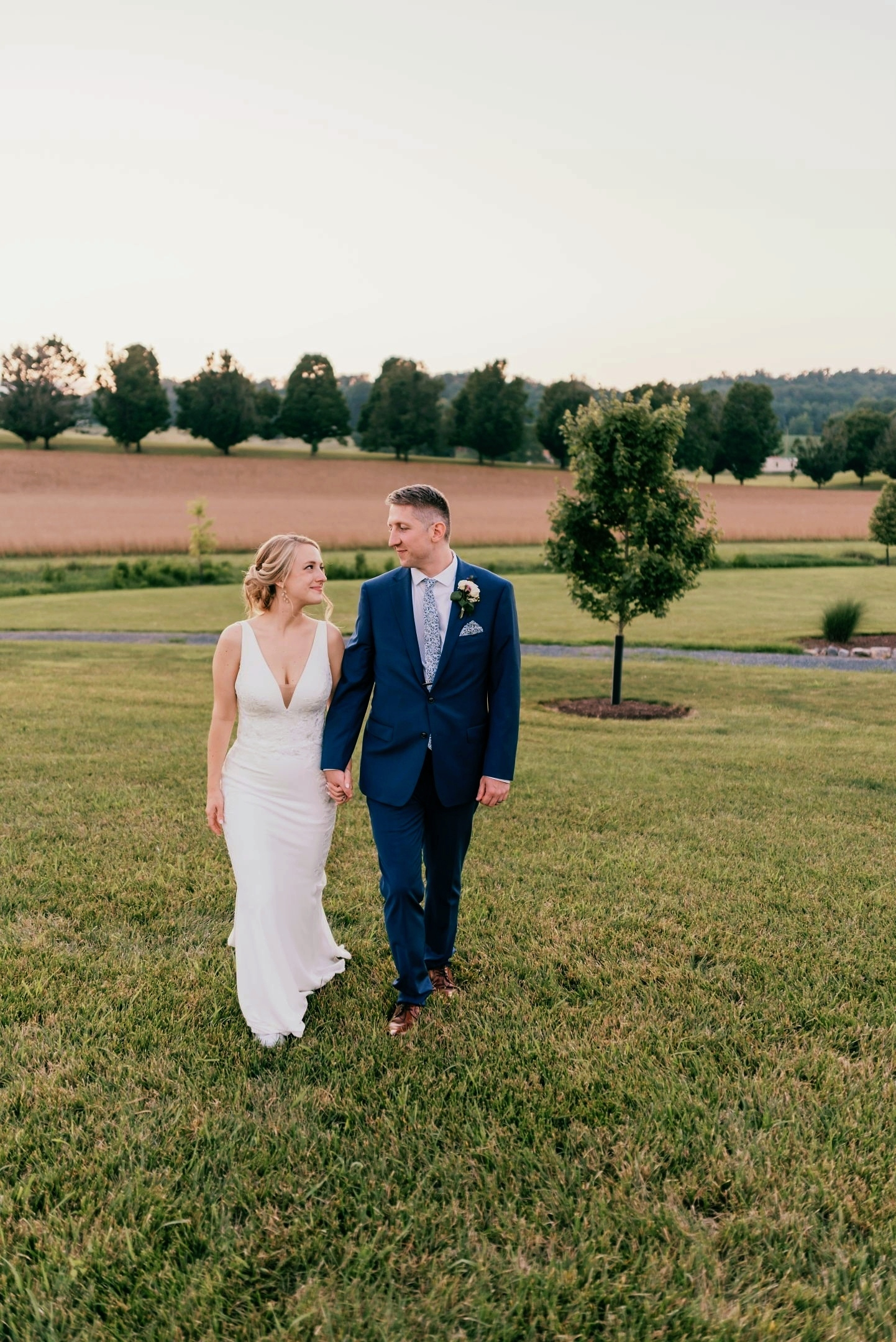 bride+and+groom+walking+rva+weddings.png