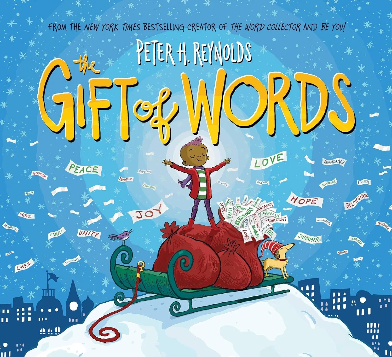 Book cover titled "The Gift of Words" by Peter H. Reynolds shows a child on a sleigh, standing on a pile of red bags, surrounded by snowflakes and cityscape silhouette. Words like peace, love, hope, joy, and words such as nurture, harmony, and belong