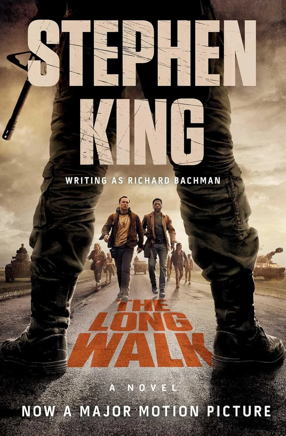 Movie poster for "The Long Walk" featuring large boots and soldiers walking down a road, with the title and author Richard Bachman