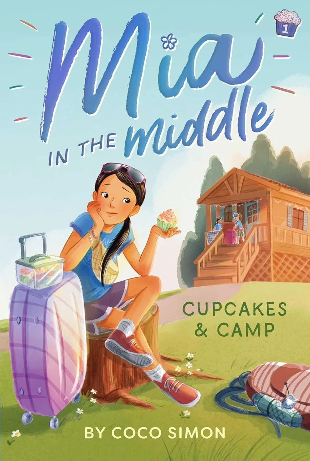 Book cover for "Mia in the Middle: Cupcakes & Camp" by Coco Simon.