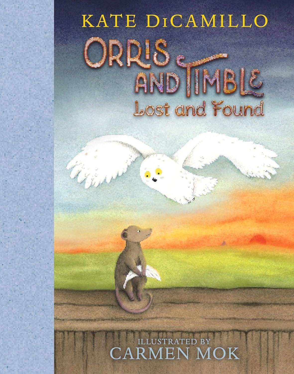 Book cover of "Orris and Timble: Lost and Found" by Kate DiCamillo, illustrated by Carmen Mok, featuring an owl in flight and a sitting animal with a sunrise in the background.