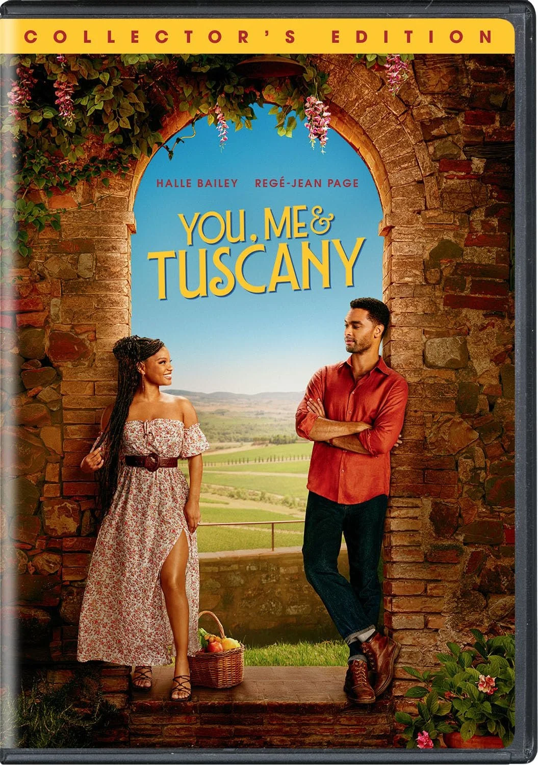 Cover of the movie 'You, Me & Tuscany,' showing a woman in a floral dress with a slit and a man in a red shirt with rolled-up sleeves, standing by a rustic stone archway overlooking Tuscan countryside.
