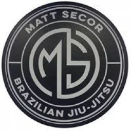 Circular logo for Matt Secor Brazilian Jiu-Jitsu with his initials MS enclosed, and text around the edge reading 'Matt Secor Brazilian Jiu-Jitsu'.