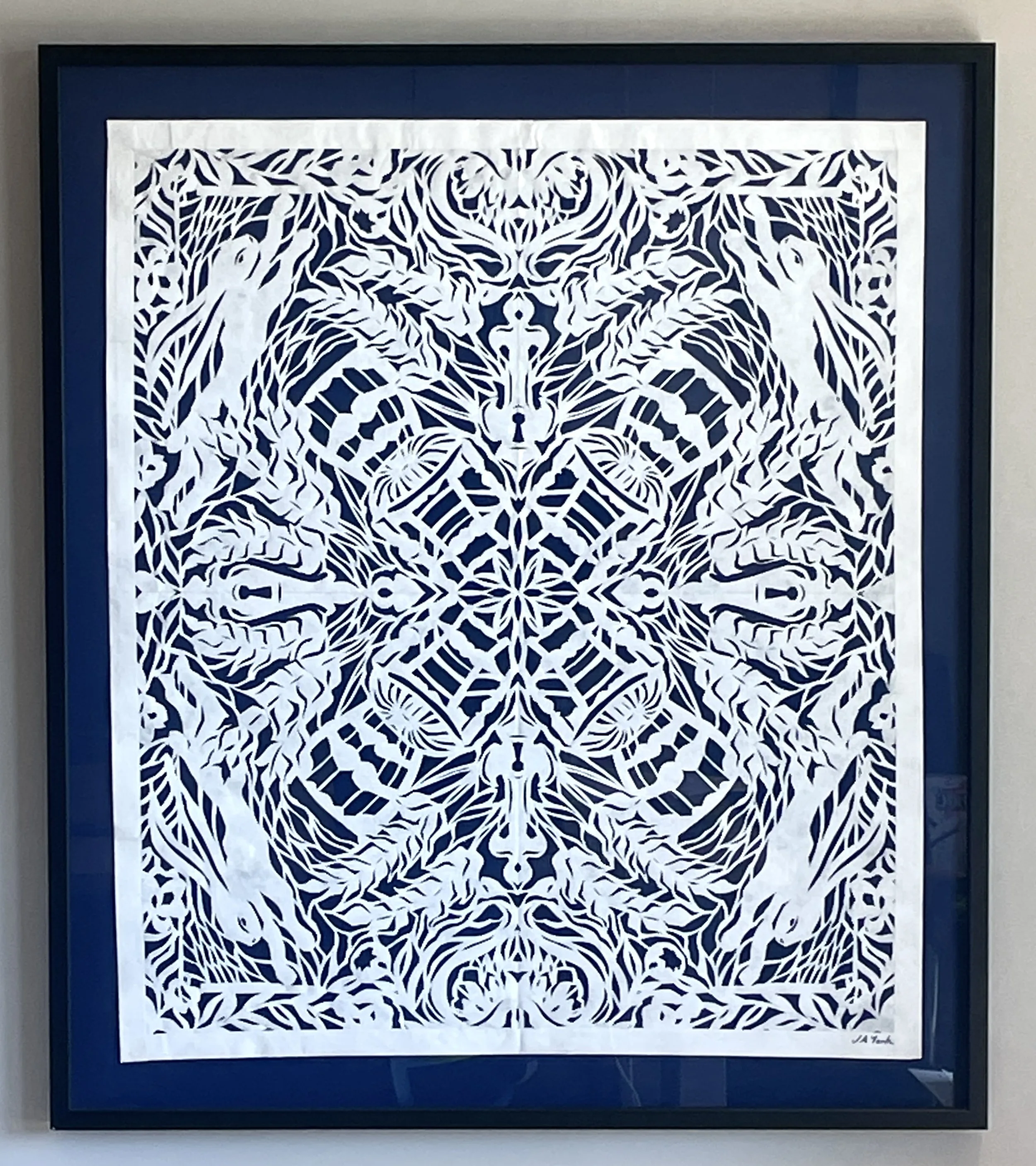 "Rabbit Run," tyvek papercut, framed. 41"h x 36"w x 2"d. Cut on site in Rochefocault, France, 2024.