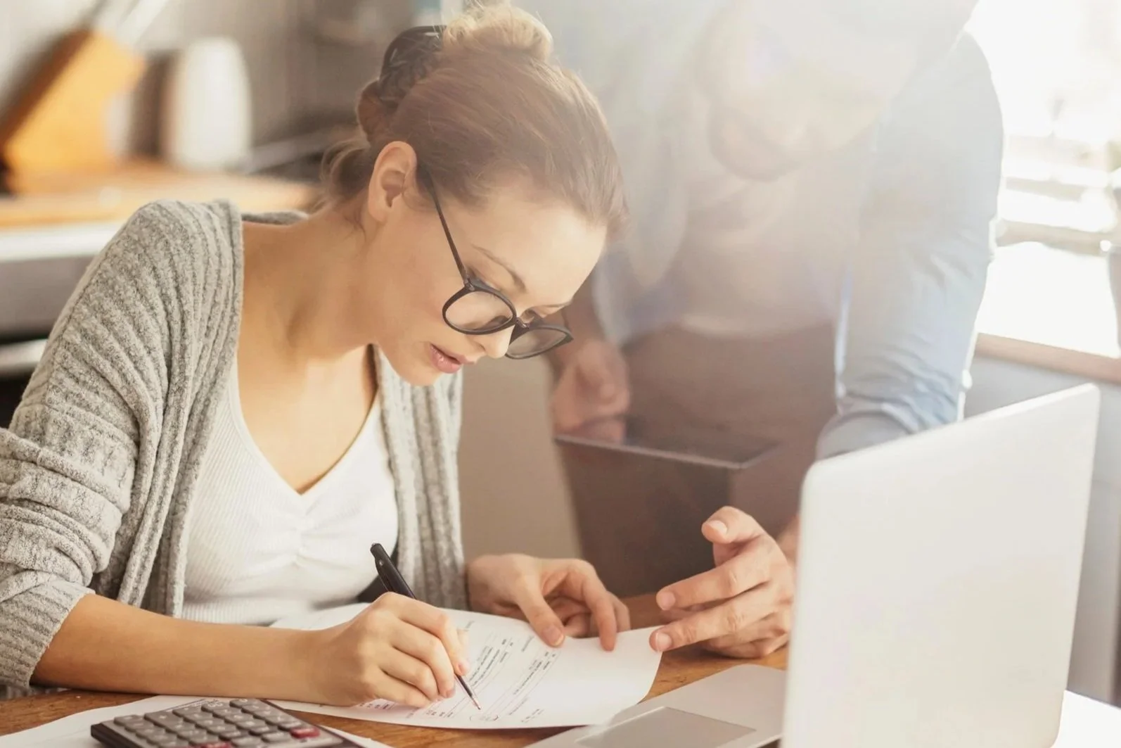 husband and wife working on their personal budget