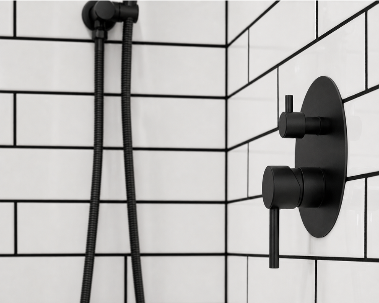 White subway tile with black grout and black fixtures