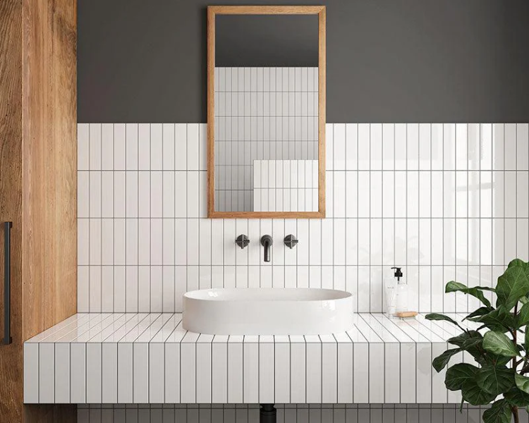 White tile with black grout and black fixtures