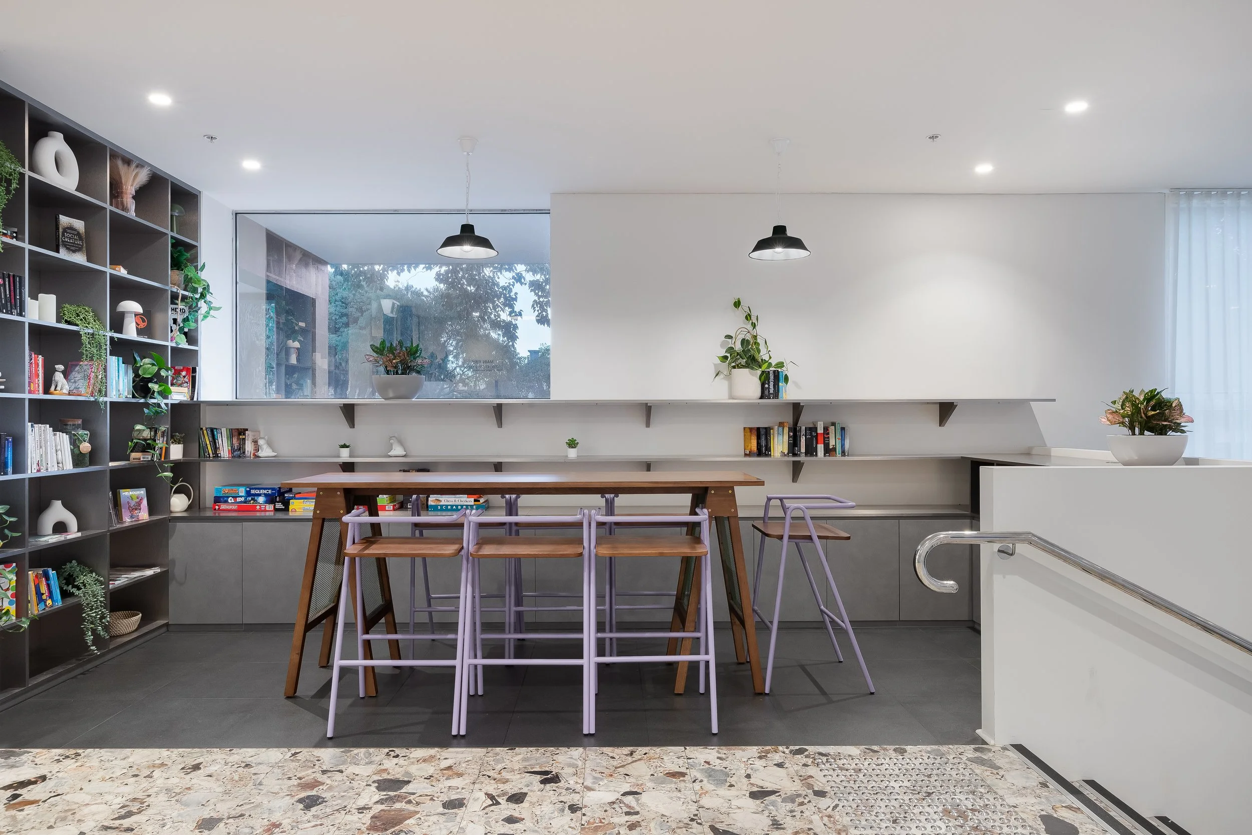 communal area with table and chairs