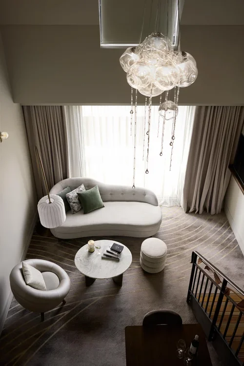 ROOM712+214_LOUNGE_ABOVE_HR-min.webp