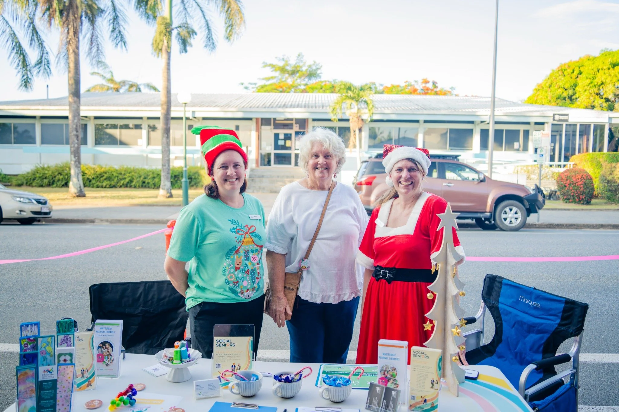 Community stallholders sharing smiles at last year’s fair.