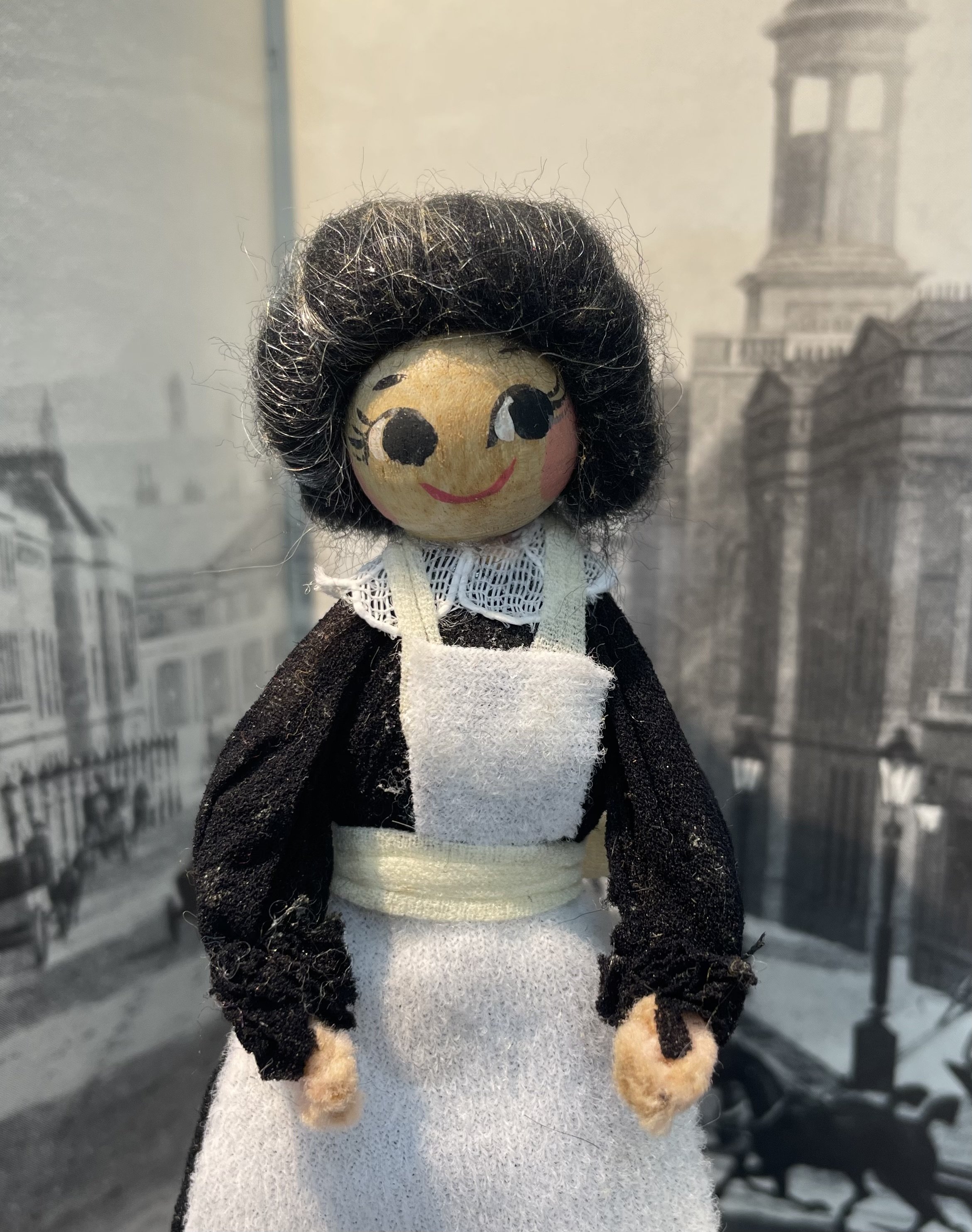 Vintage wooden headed Maid.