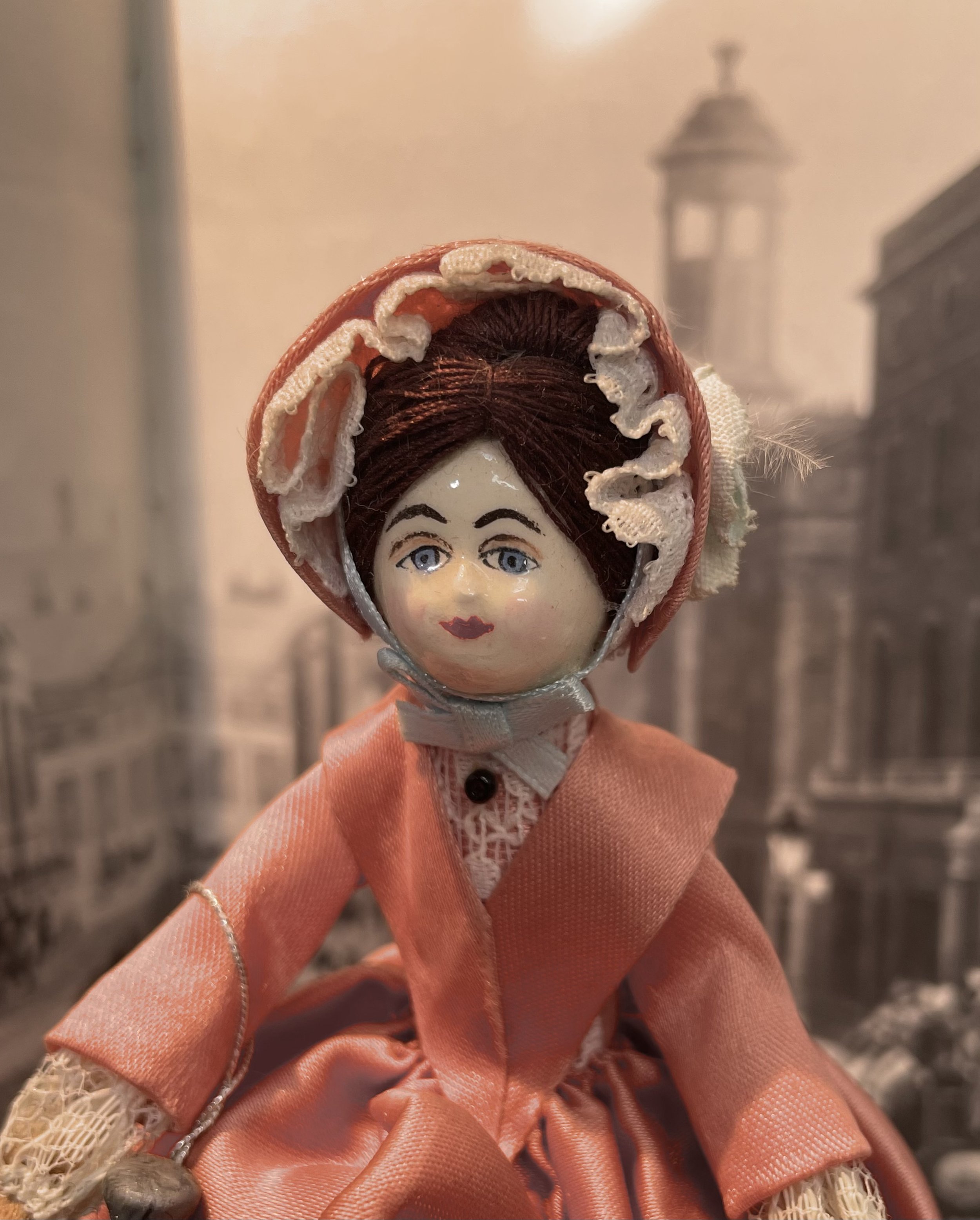 Vintage peg doll with hand painted face.