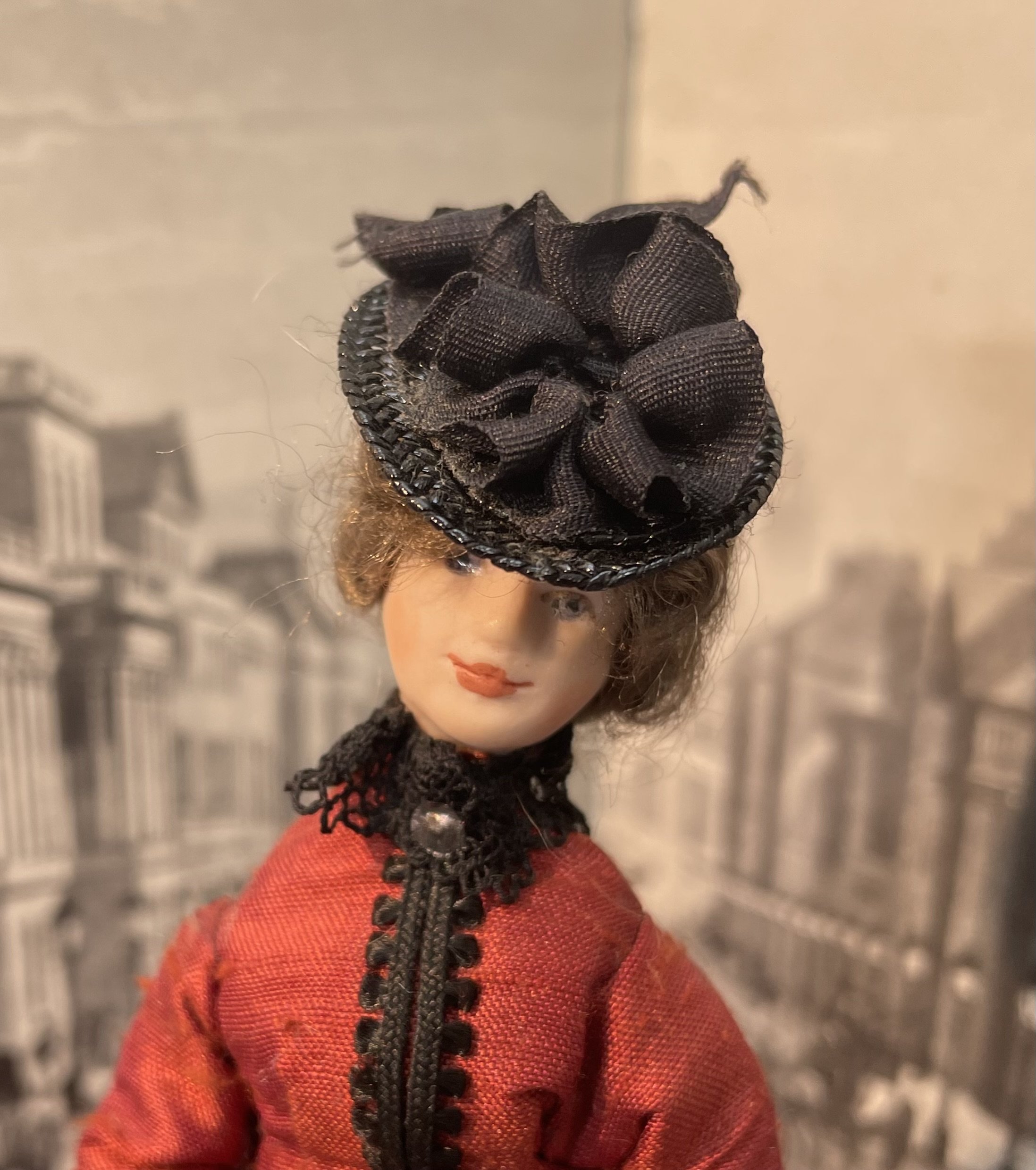Lady wearing a fitted red & black dress.