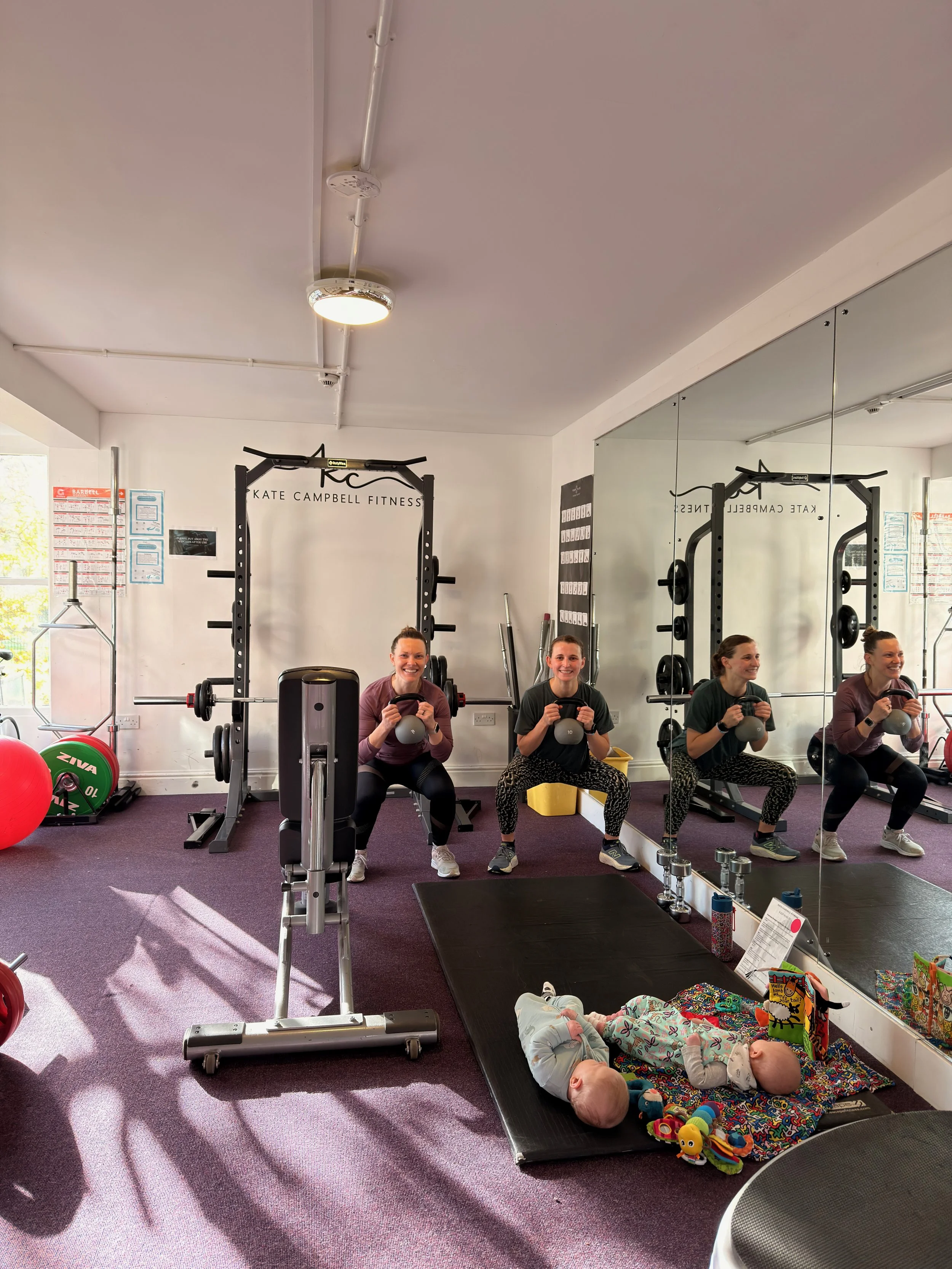 Rachael T and freind baby in gym .jpeg