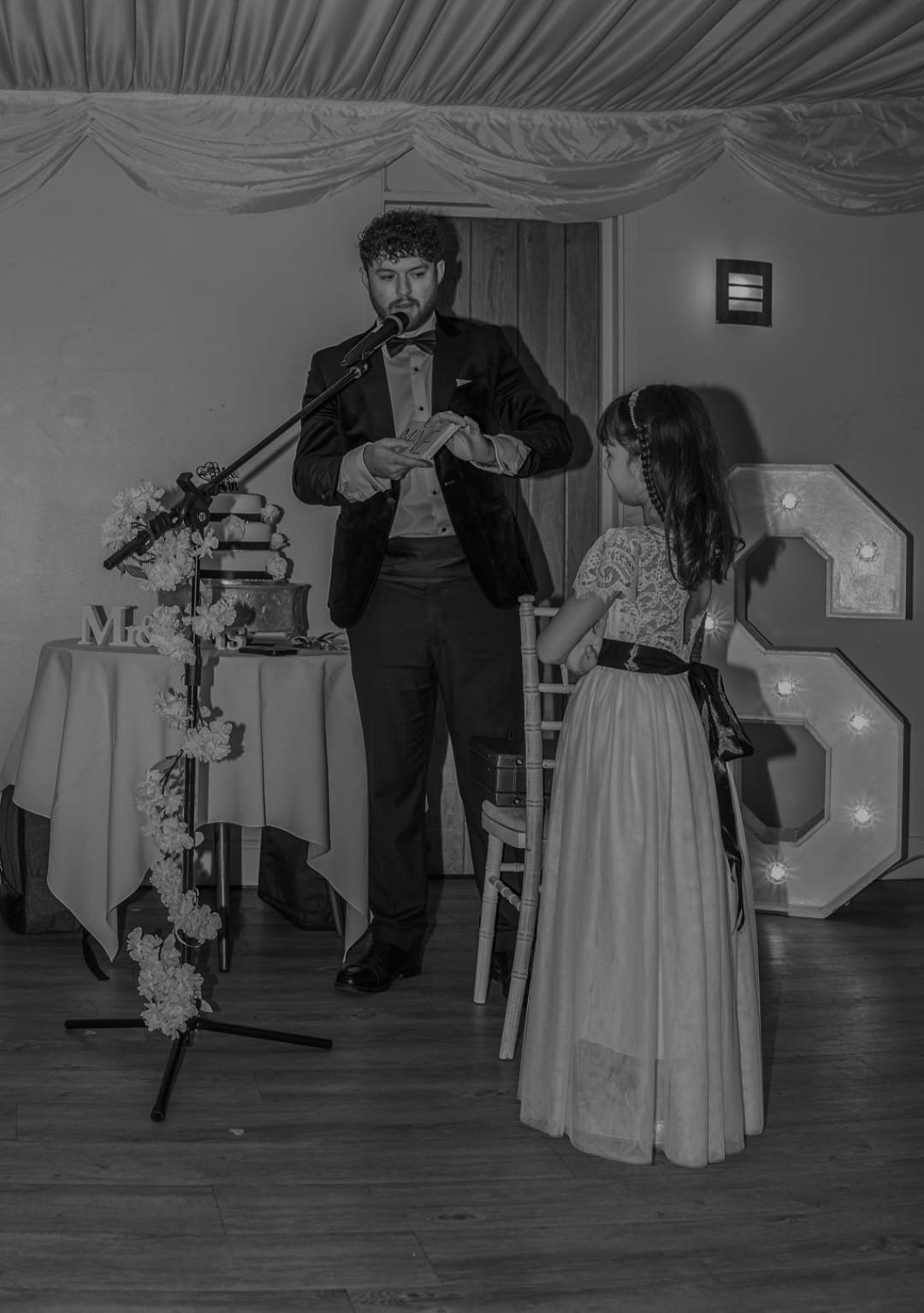 Wedding magician entertaining guests