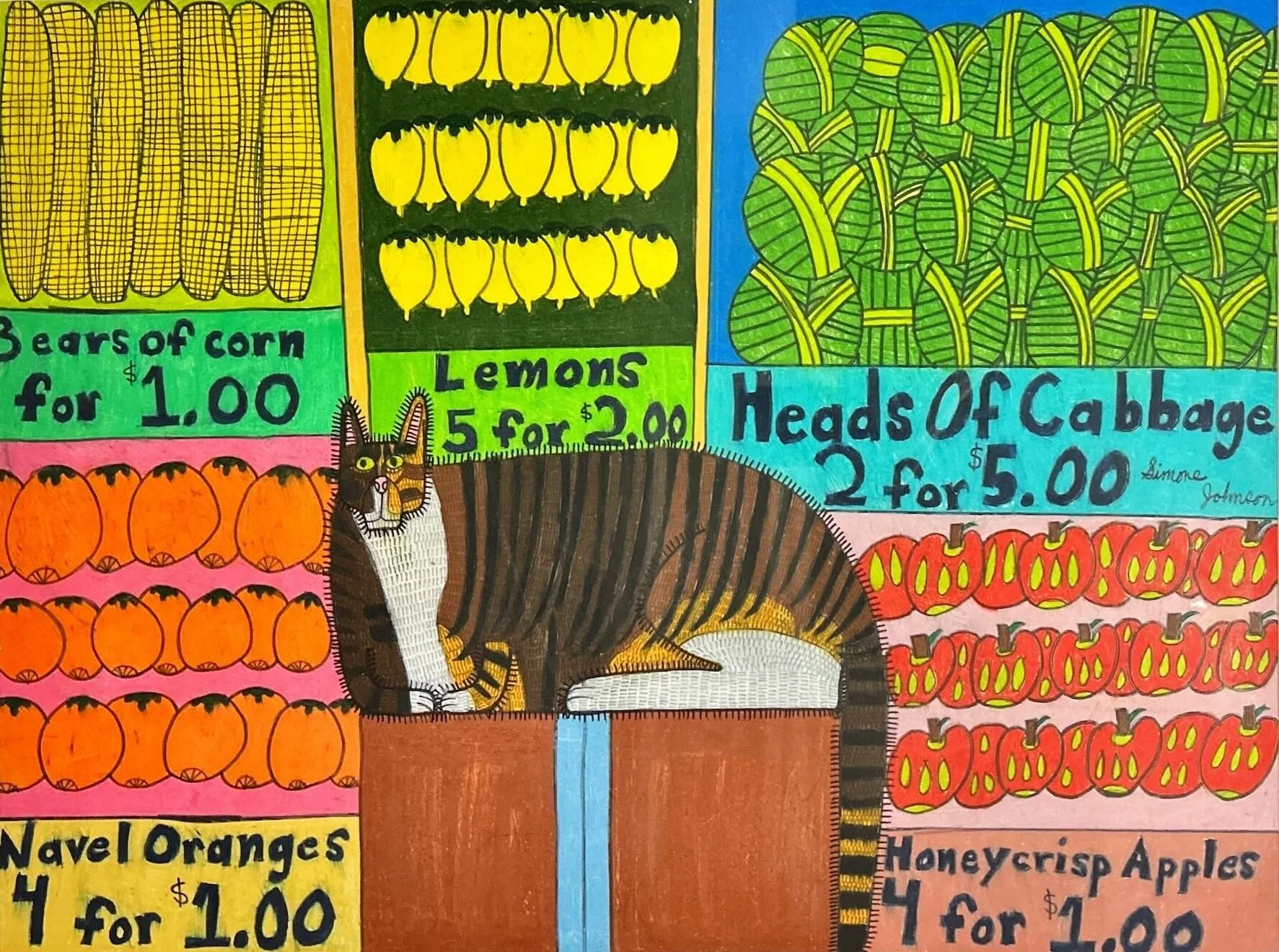 A brown &amp; black stripy cat with white patches lies amongst an eye-catching, bright display of different fruit &amp; veg including oranges, apples &amp; corn. All produce is sorted &amp; priced
