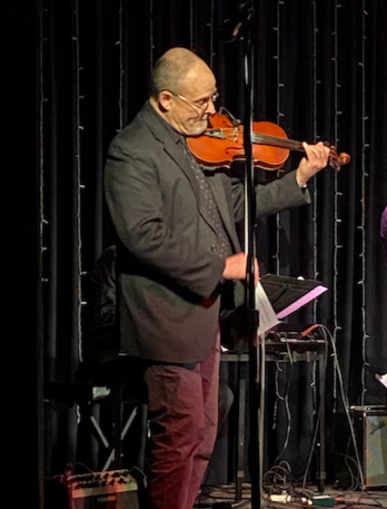 Reed Simon playing violin