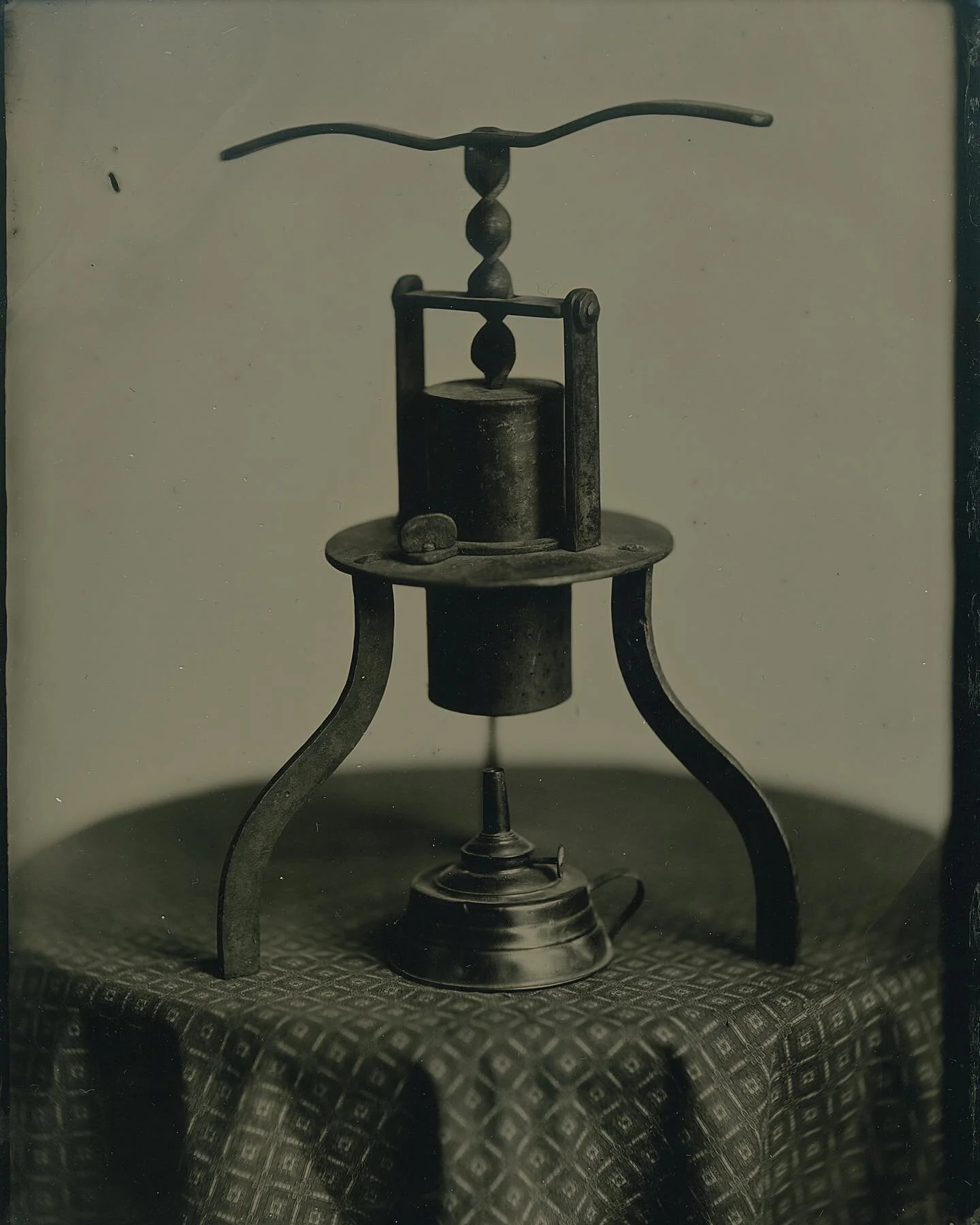 Donna and I thoroughly enjoyed the wet plate collodion workshop we took this past summer. A good portion of it was spent discussing lighting based on surfaces and textures. 

1 Meat juicer with an alcohol burner
2 Still-life with different textures
3