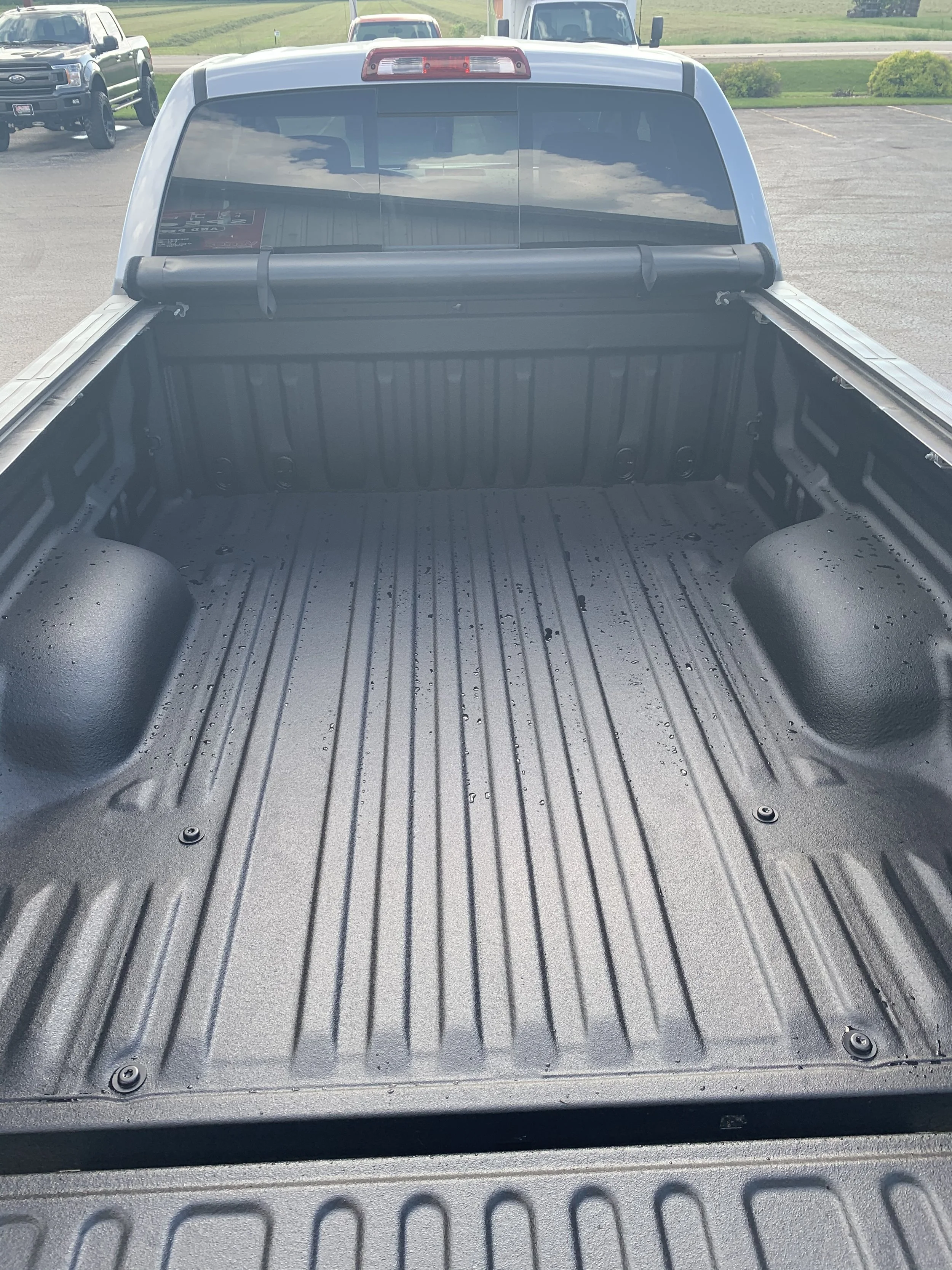 Finished product. Can't even tell! Looks good even with the rain!