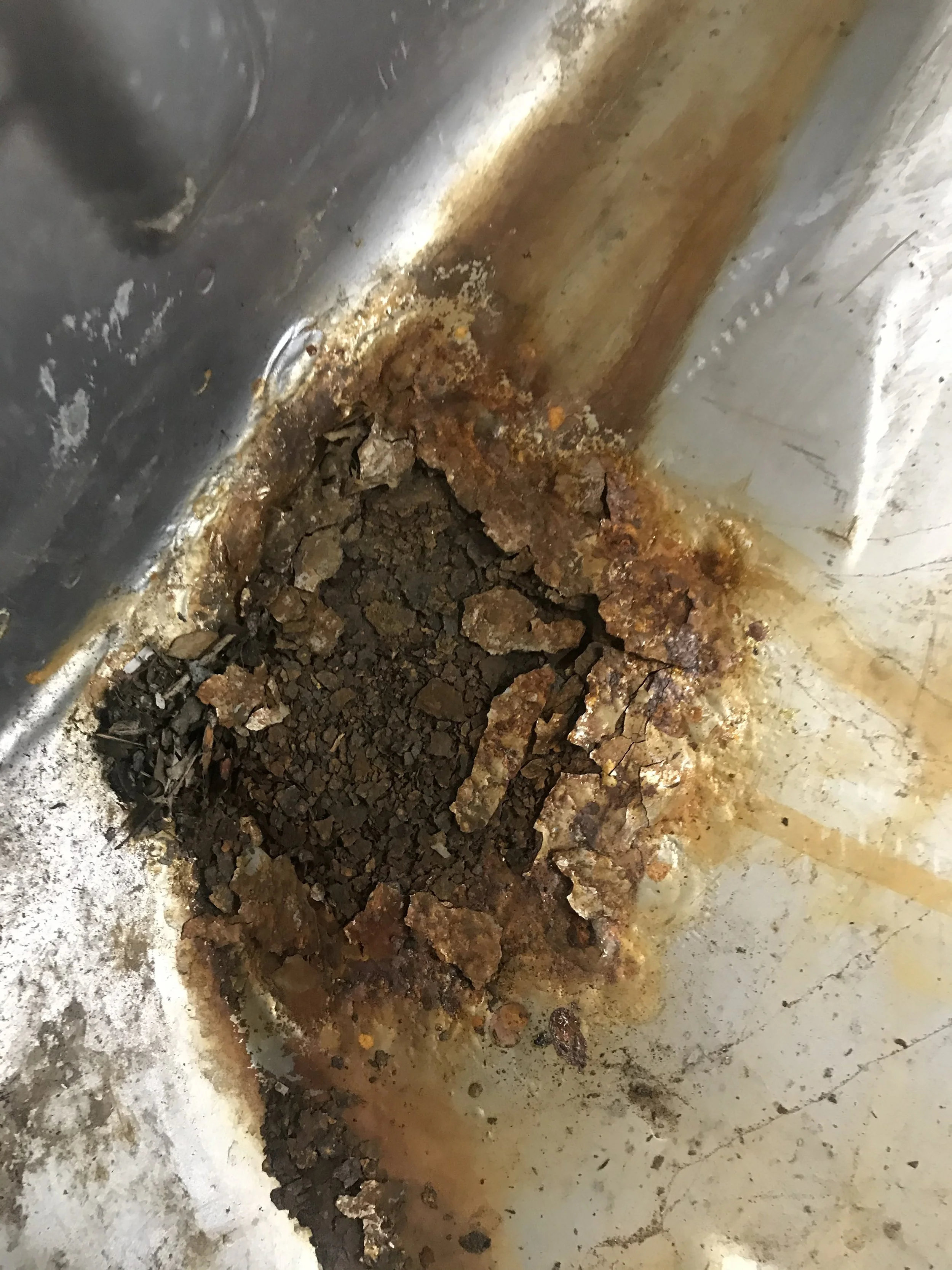 Extremely rusted Toyota bed.