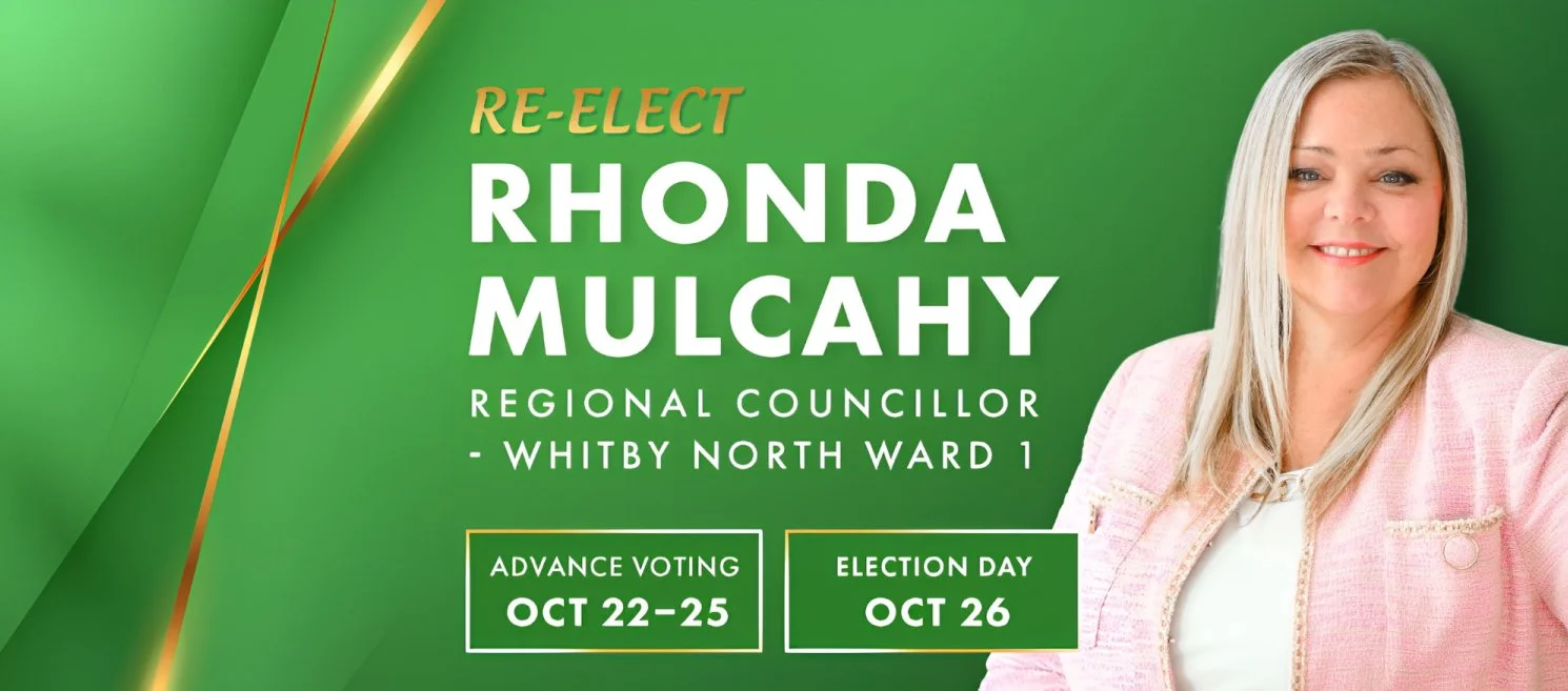 Campaign poster for Rhonda Mulcahy, a regional council candidate, with a smiling woman in a pink blazer on a green background, indicating advance voting from October 22-25 and election day October 26.