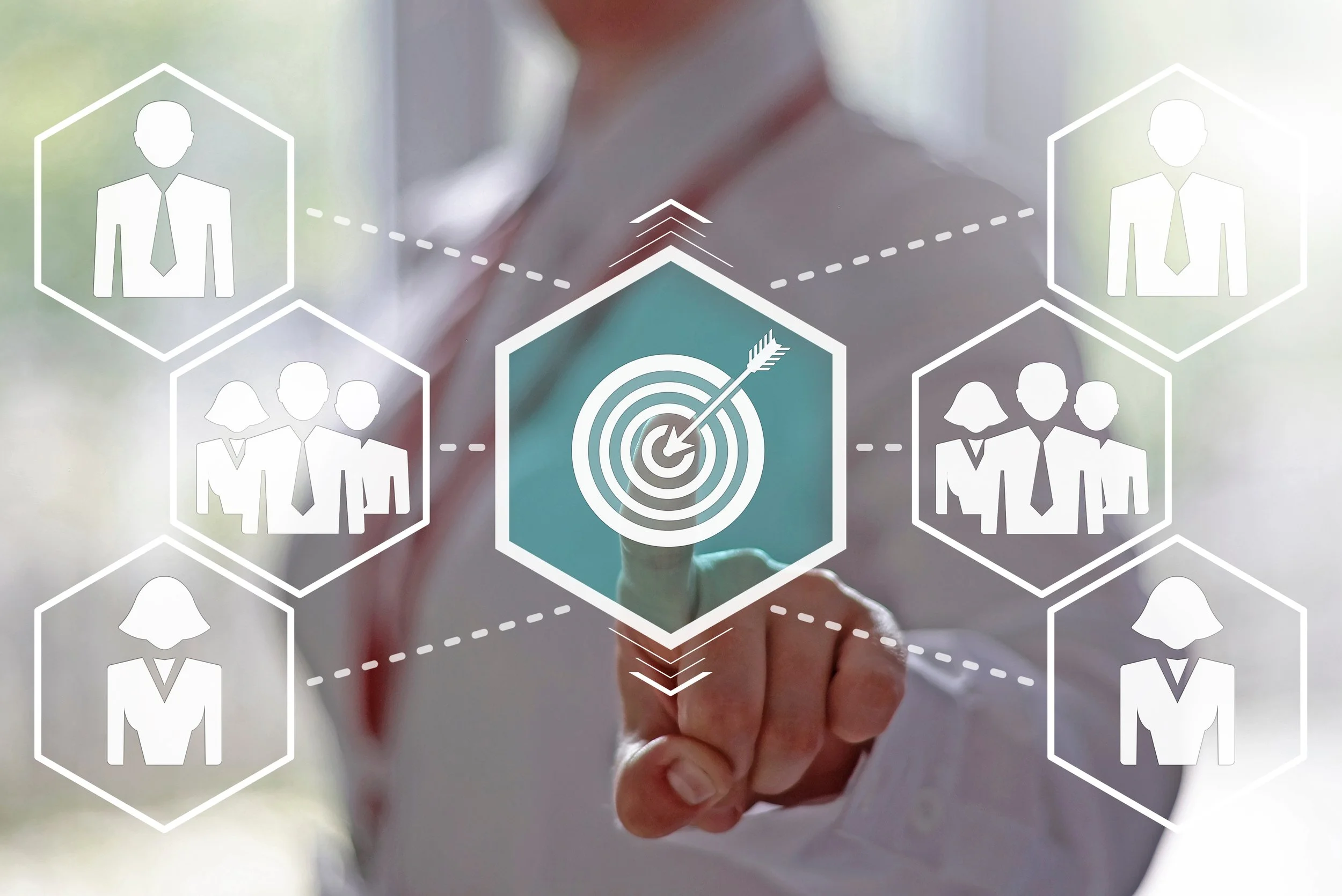 Person in business attire pointing at a digital target with an arrow, surrounded by icons of people representing a team or network.