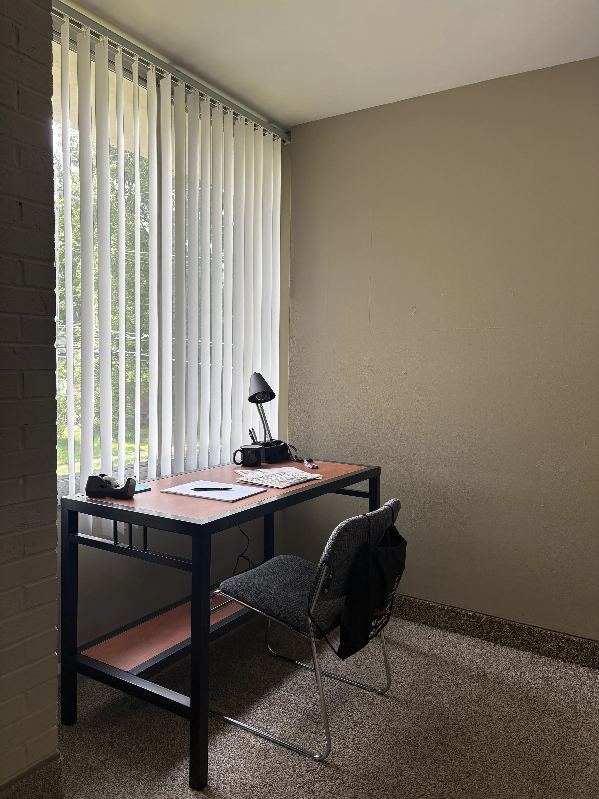 luxury private suite desk and window.jpeg
