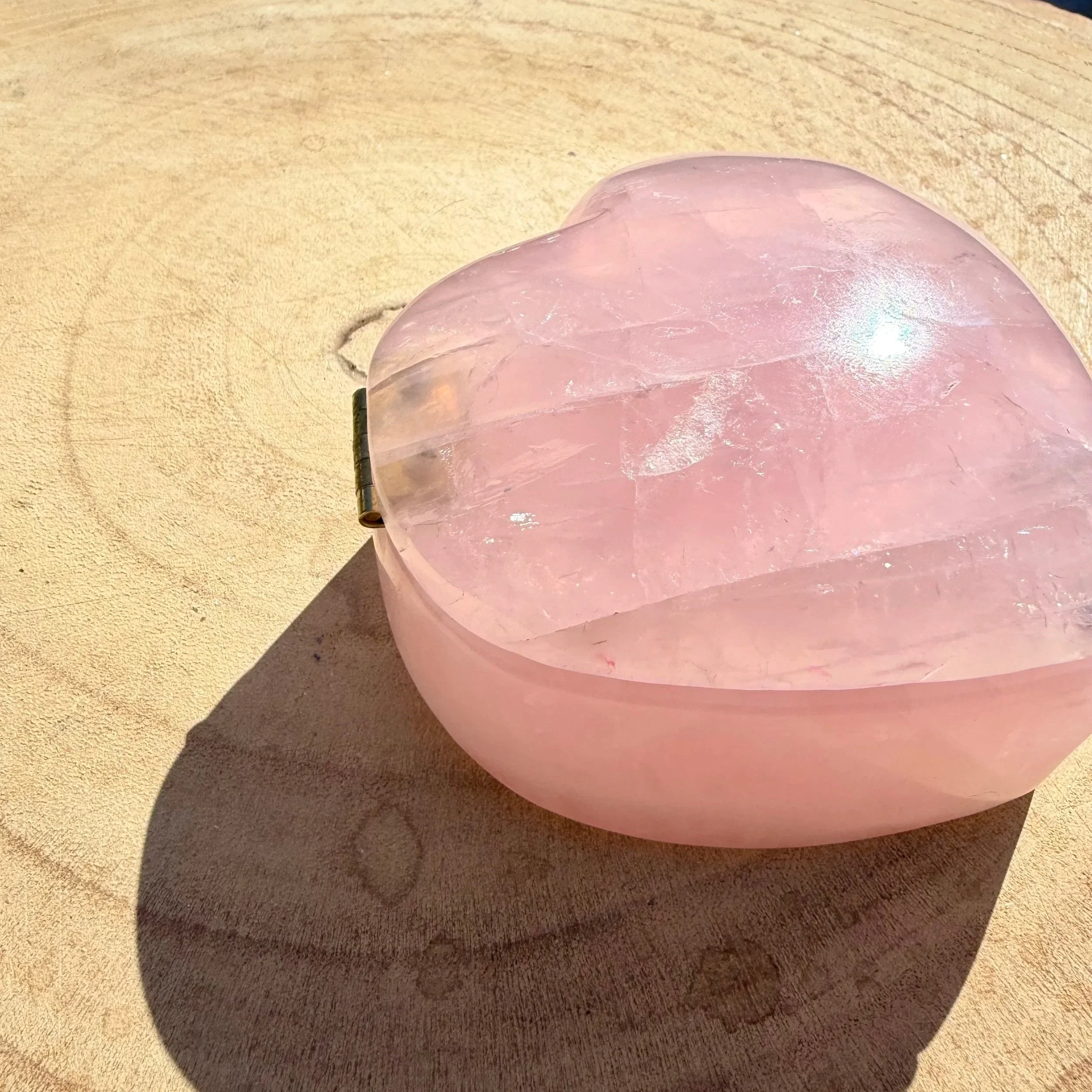Material: Rose Quartz  
Custom Made Engagement Ring Box  
Sold  
This was a custom order for a heart shaped engagement ring box made out of Rose Quartz. The client requested a hinge, which was tricky to do in stone, but we made it work. The box is he