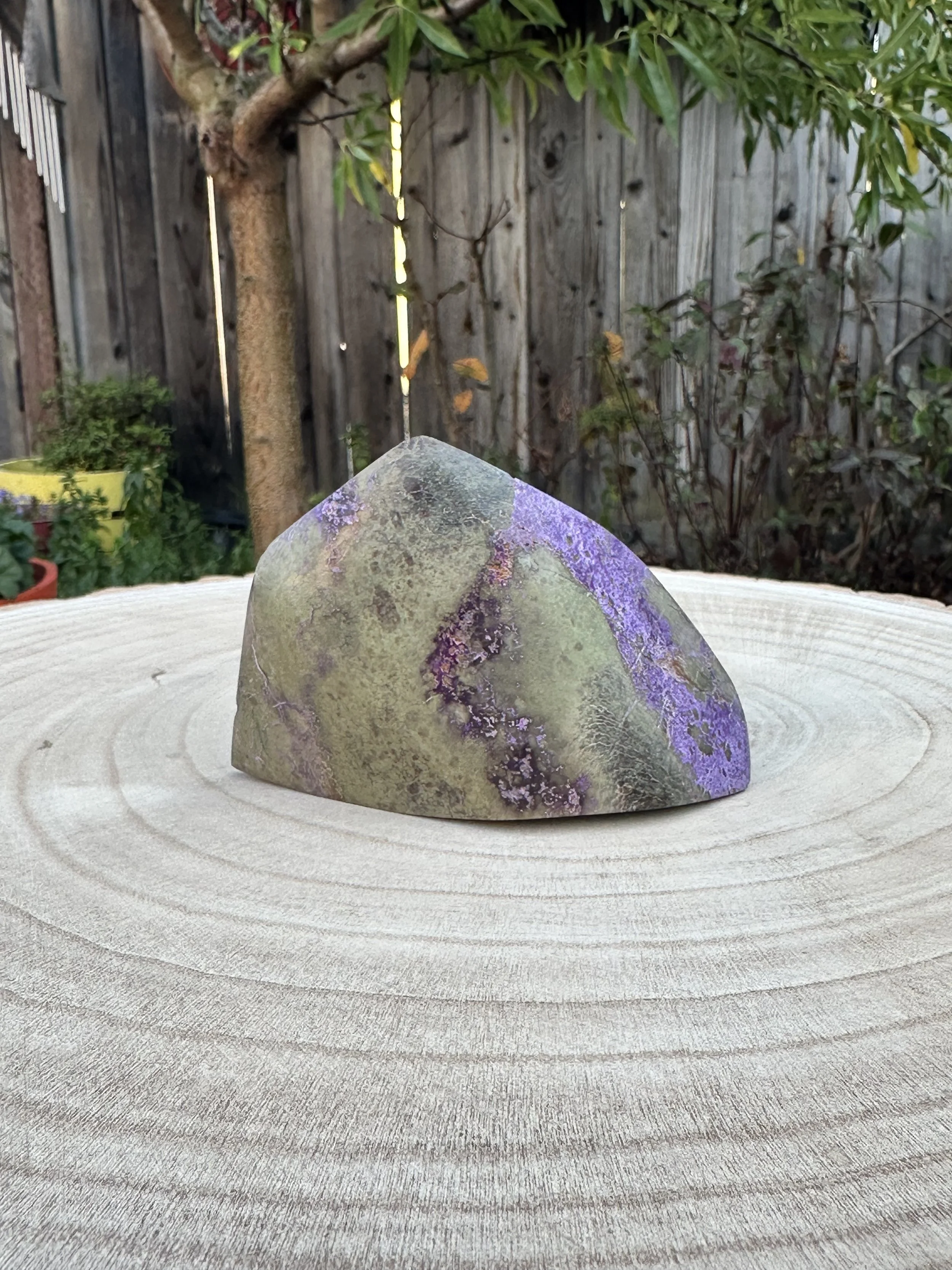 Material: Atlantisite
Sold
A custom piece made of a combination of Stichtite and Serpentine and designed to both hold space and be held.