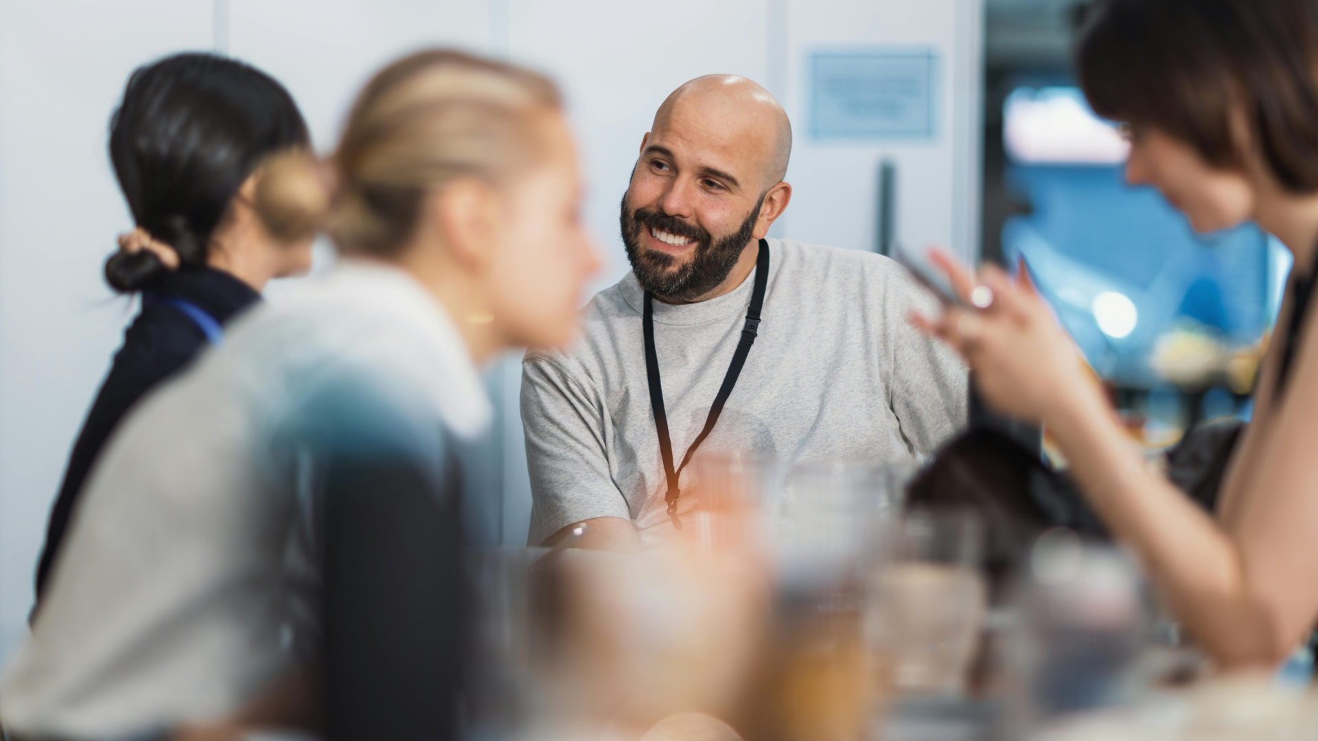 Colleagues conversing in a comfortable and high trust workplace