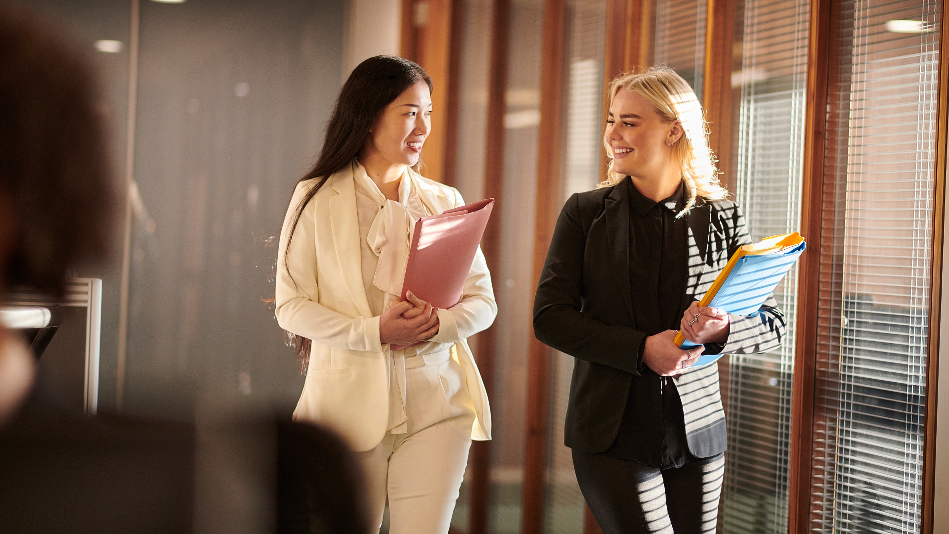 Happy attorneys at work feeling balanced professionally and personally